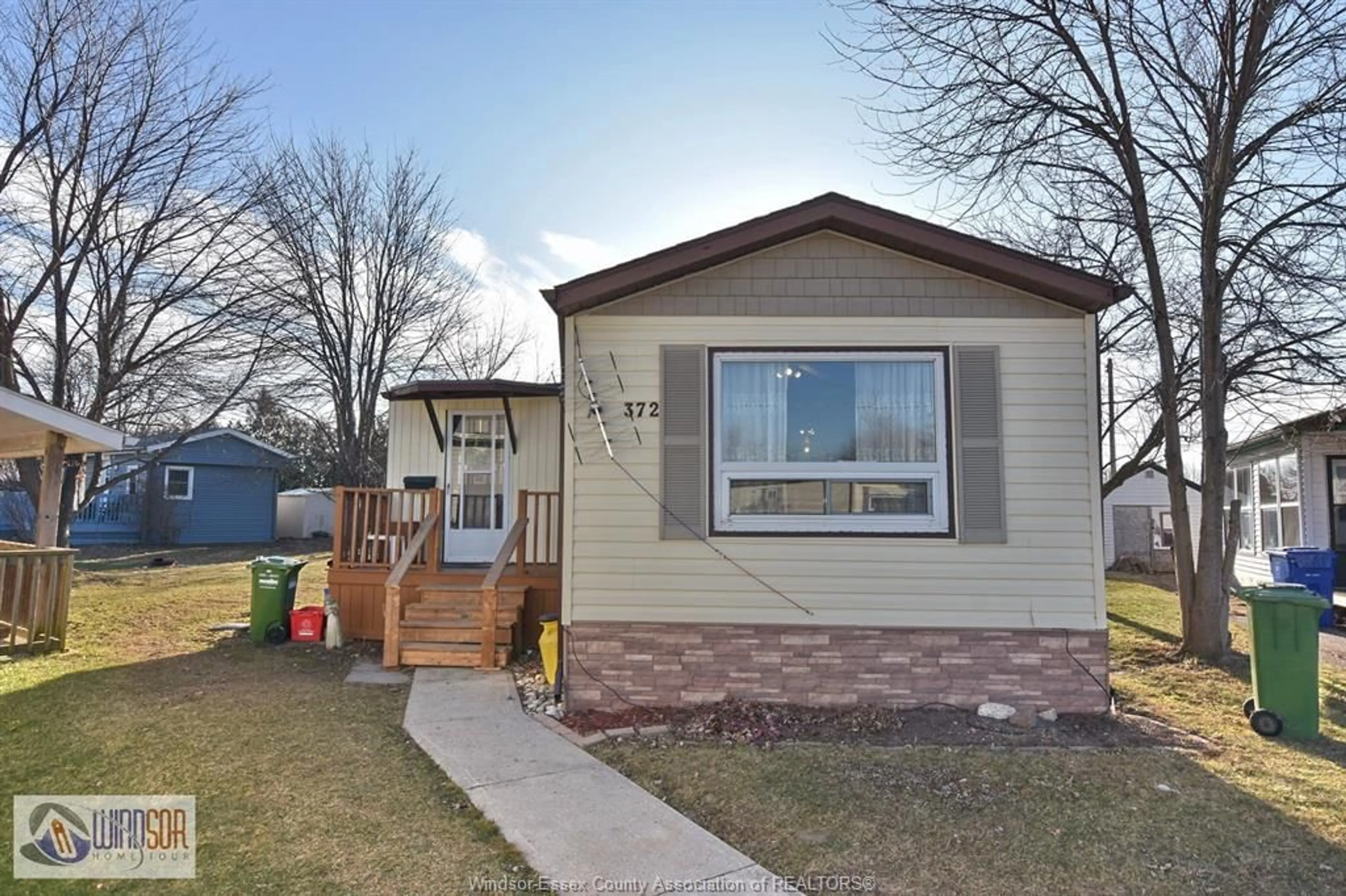 Home with vinyl exterior material, street for 327 REGENT Crt, Essex Ontario N8M 2Z2