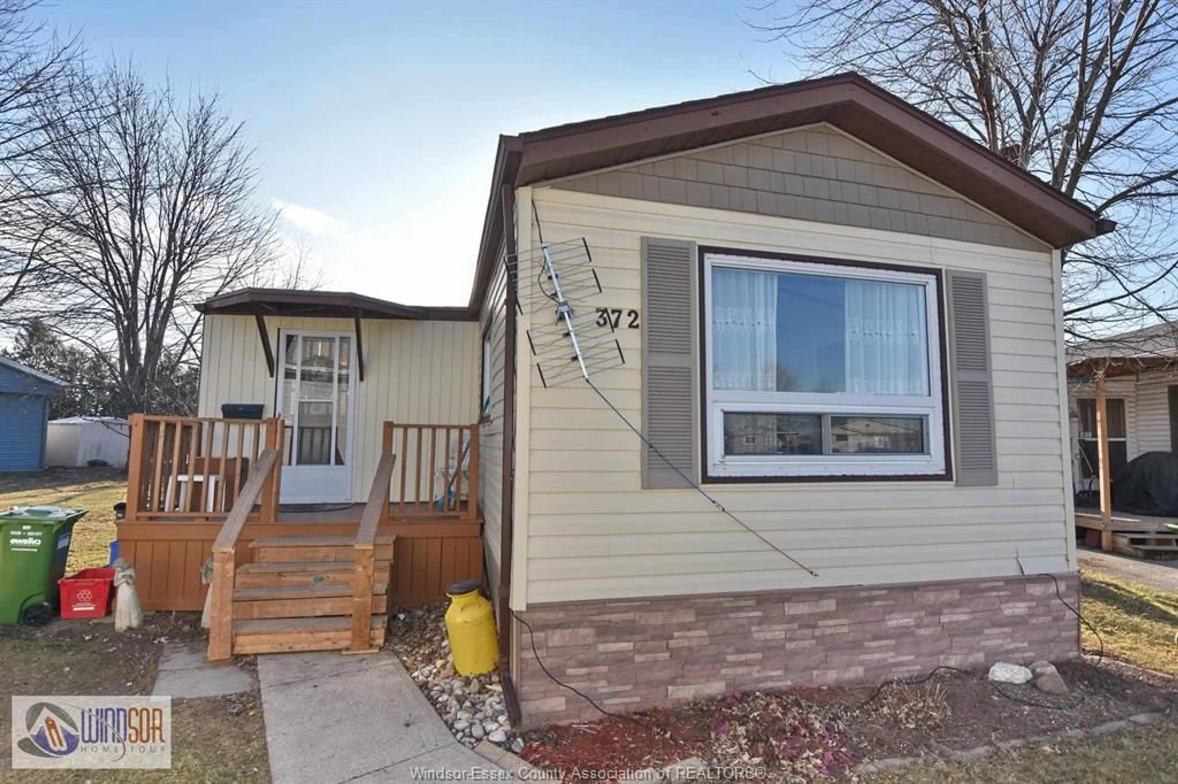 Home with vinyl exterior material, street for 327 REGENT Crt, Essex Ontario N8M 2Z2