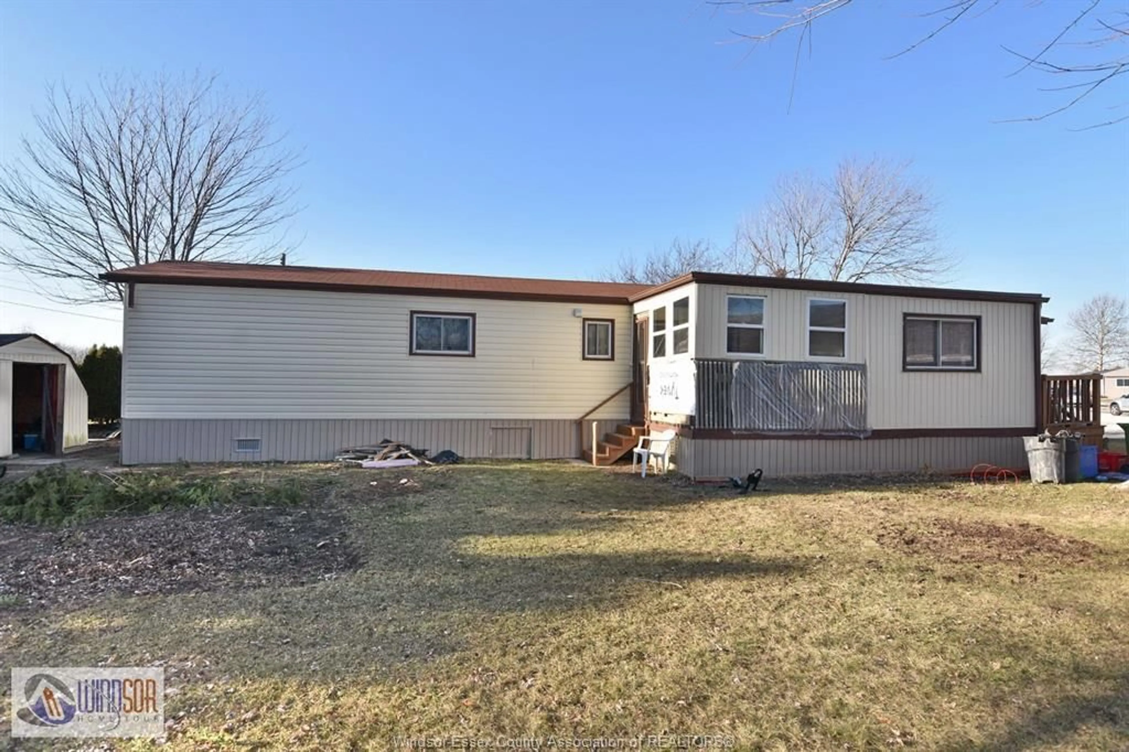 Home with vinyl exterior material, street for 327 REGENT Crt, Essex Ontario N8M 2Z2