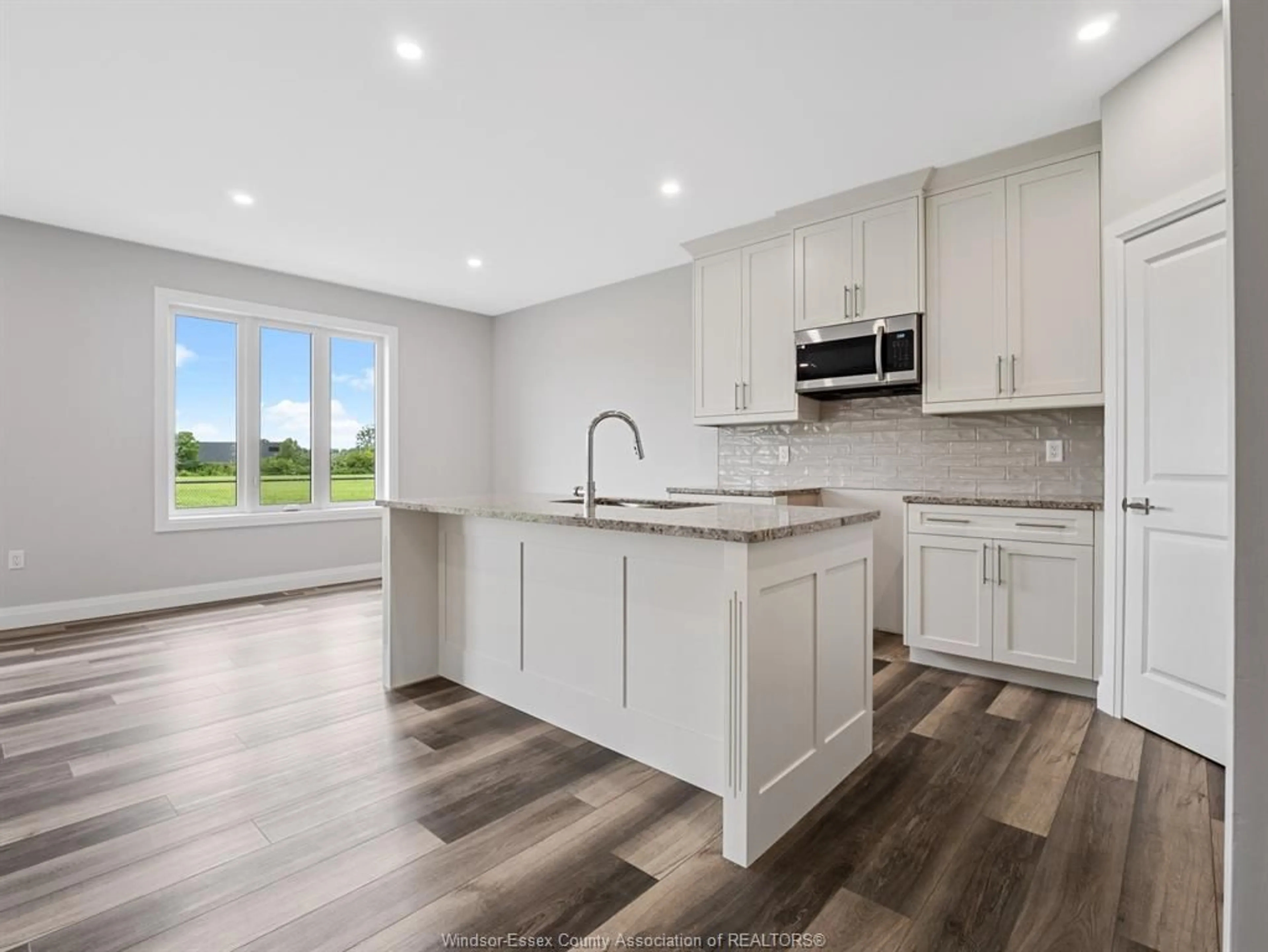 Open concept kitchen, unknown for 113 Eagle St, Leamington Ontario N8H 0G5