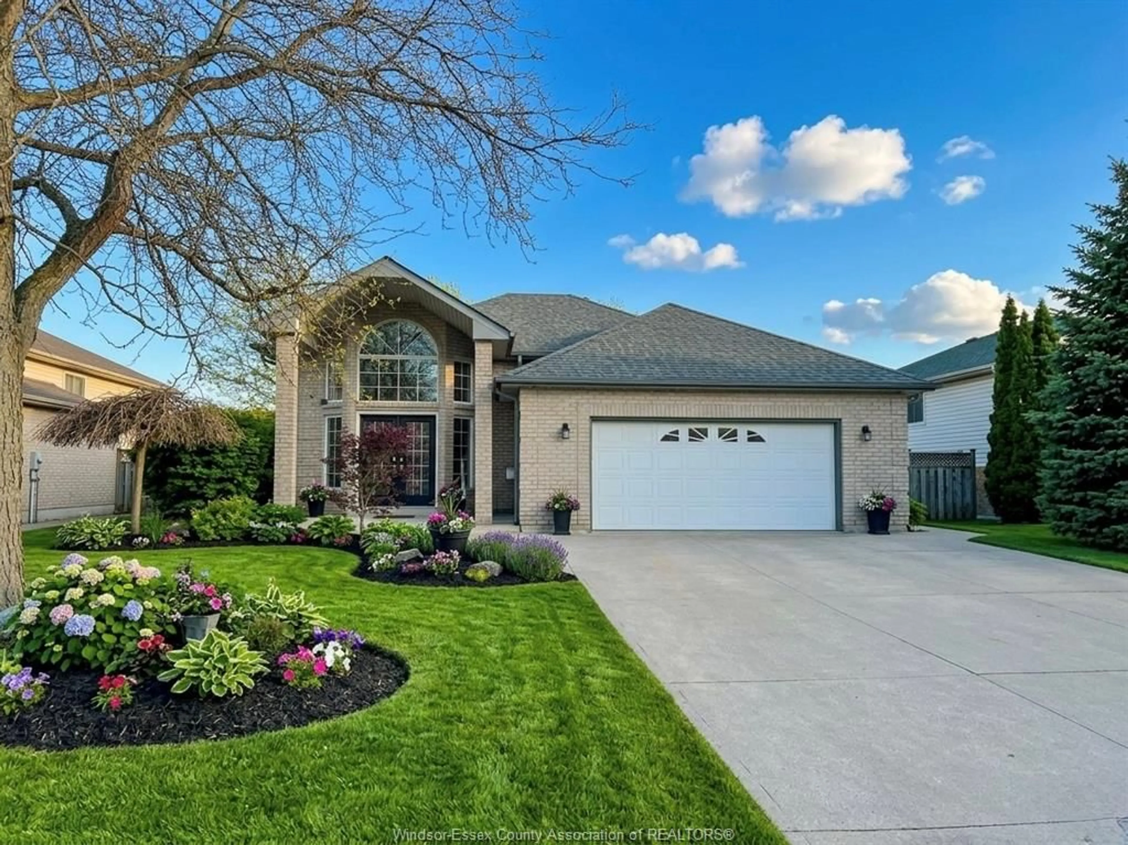 Home with brick exterior material, street for 1655 BIRCHWOOD Cres, Lakeshore Ontario N8L 1E3