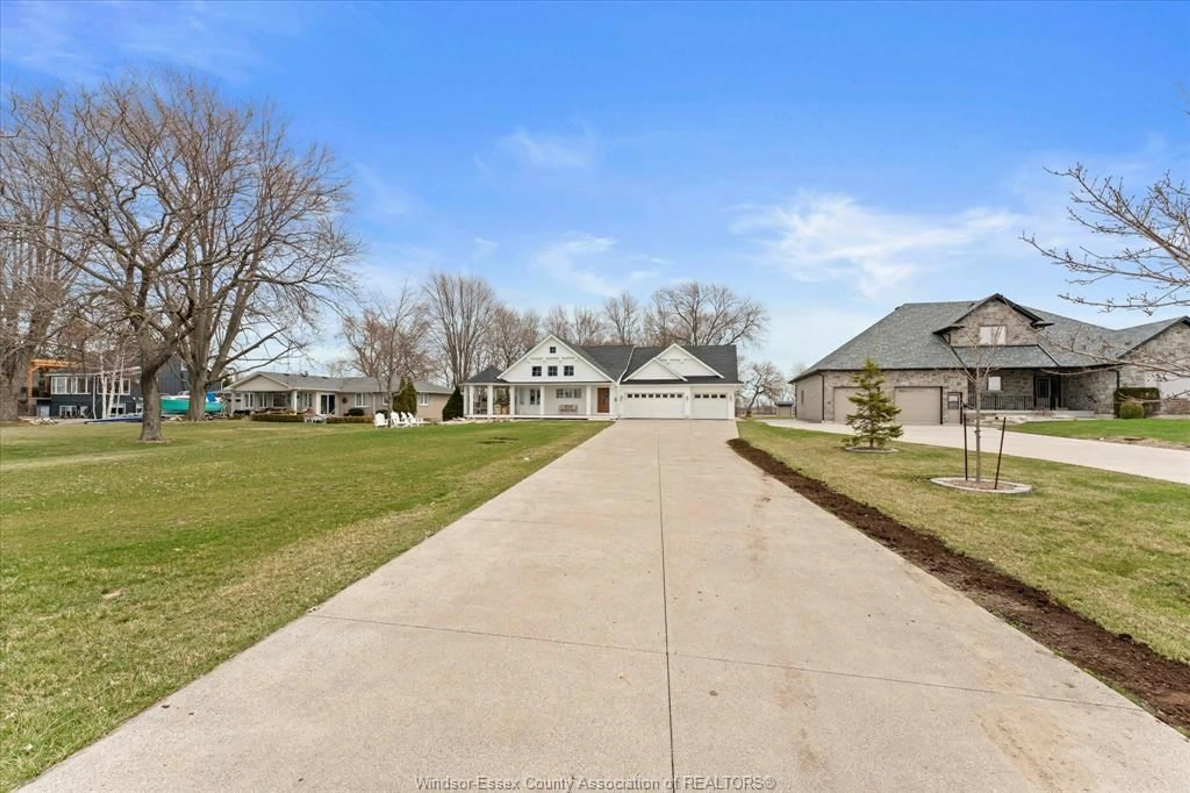 A pic from outside/outdoor area/front of a property/back of a property/a pic from drone, street for 963 FRONT Rd, Amherstburg Ontario N9V 2M4