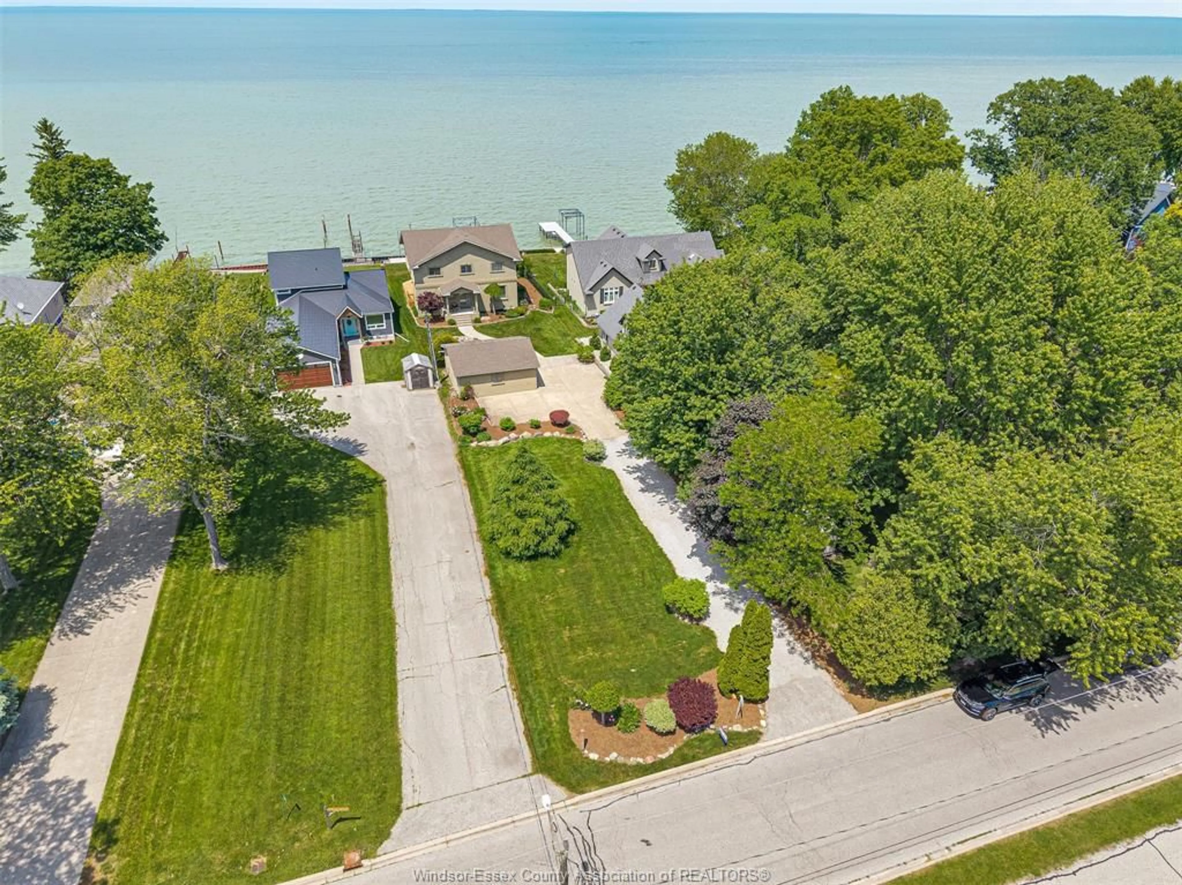 A pic from outside/outdoor area/front of a property/back of a property/a pic from drone, water/lake/river/ocean view for 281 LAKEVIEW Dr, Belle River Ontario N0R 1A0