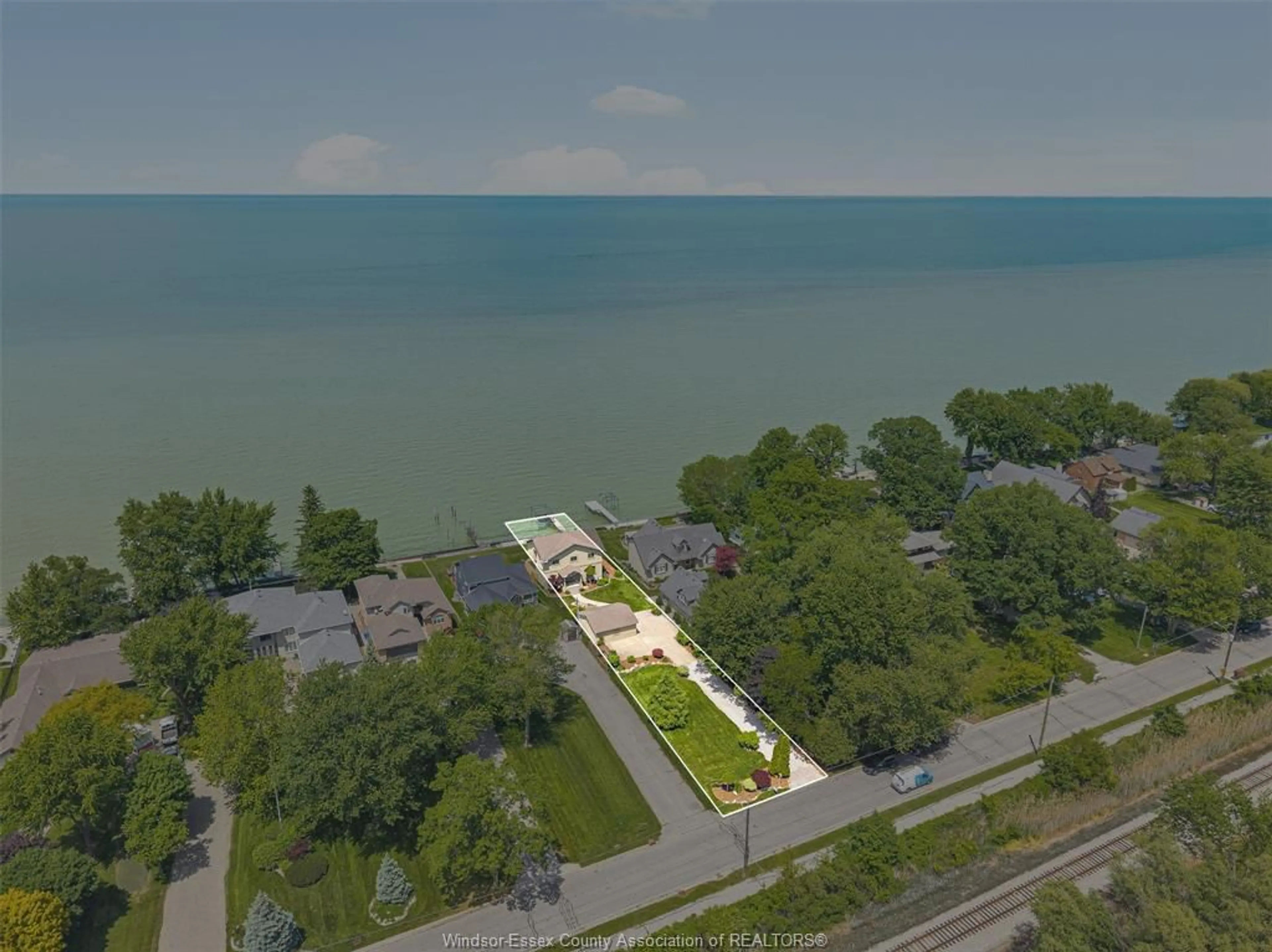 A pic from outside/outdoor area/front of a property/back of a property/a pic from drone, water/lake/river/ocean view for 281 LAKEVIEW Dr, Belle River Ontario N0R 1A0