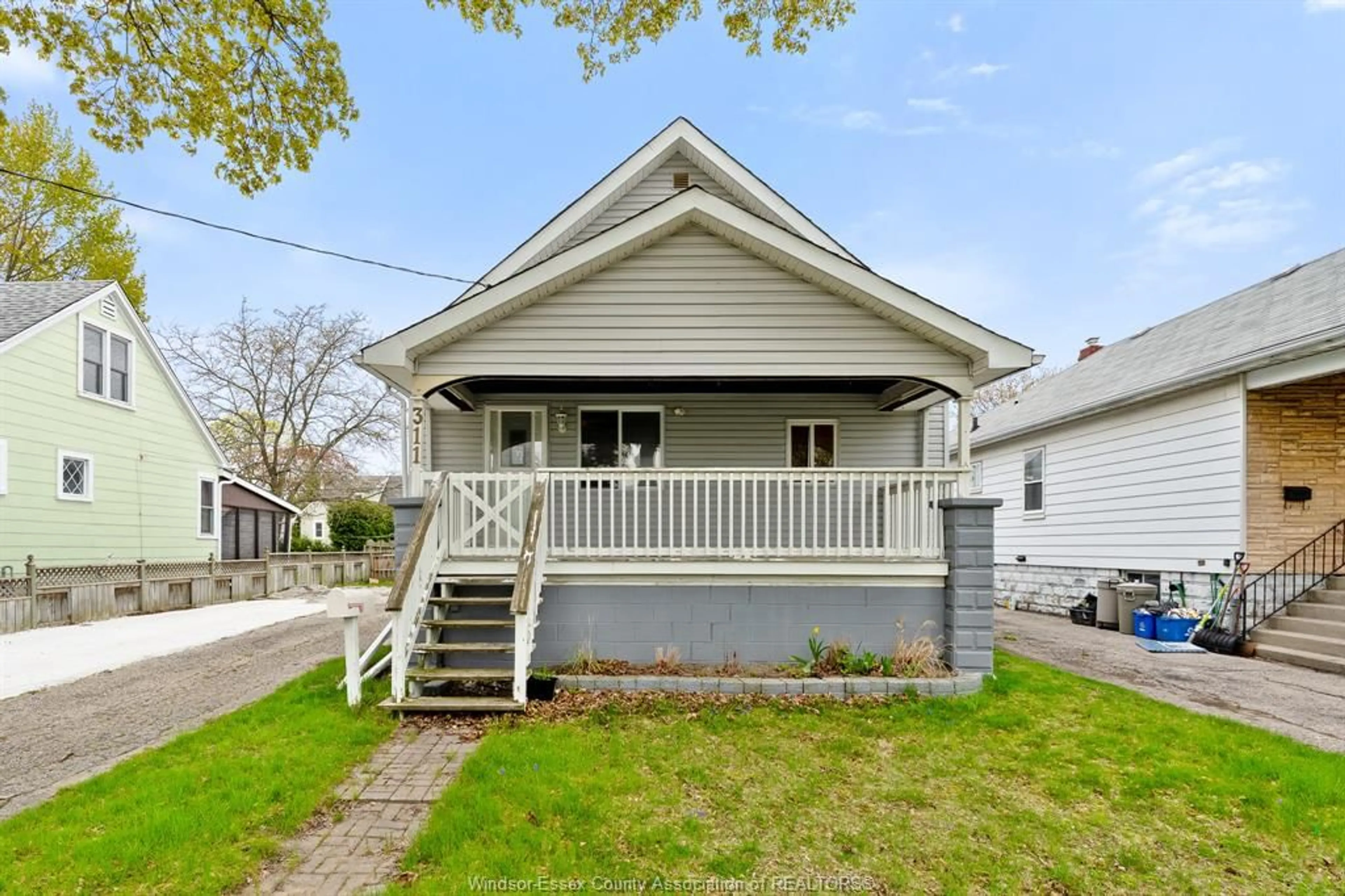 Home with vinyl exterior material, street for 311 CONRAD St, Sarnia Ontario N7T 3K4
