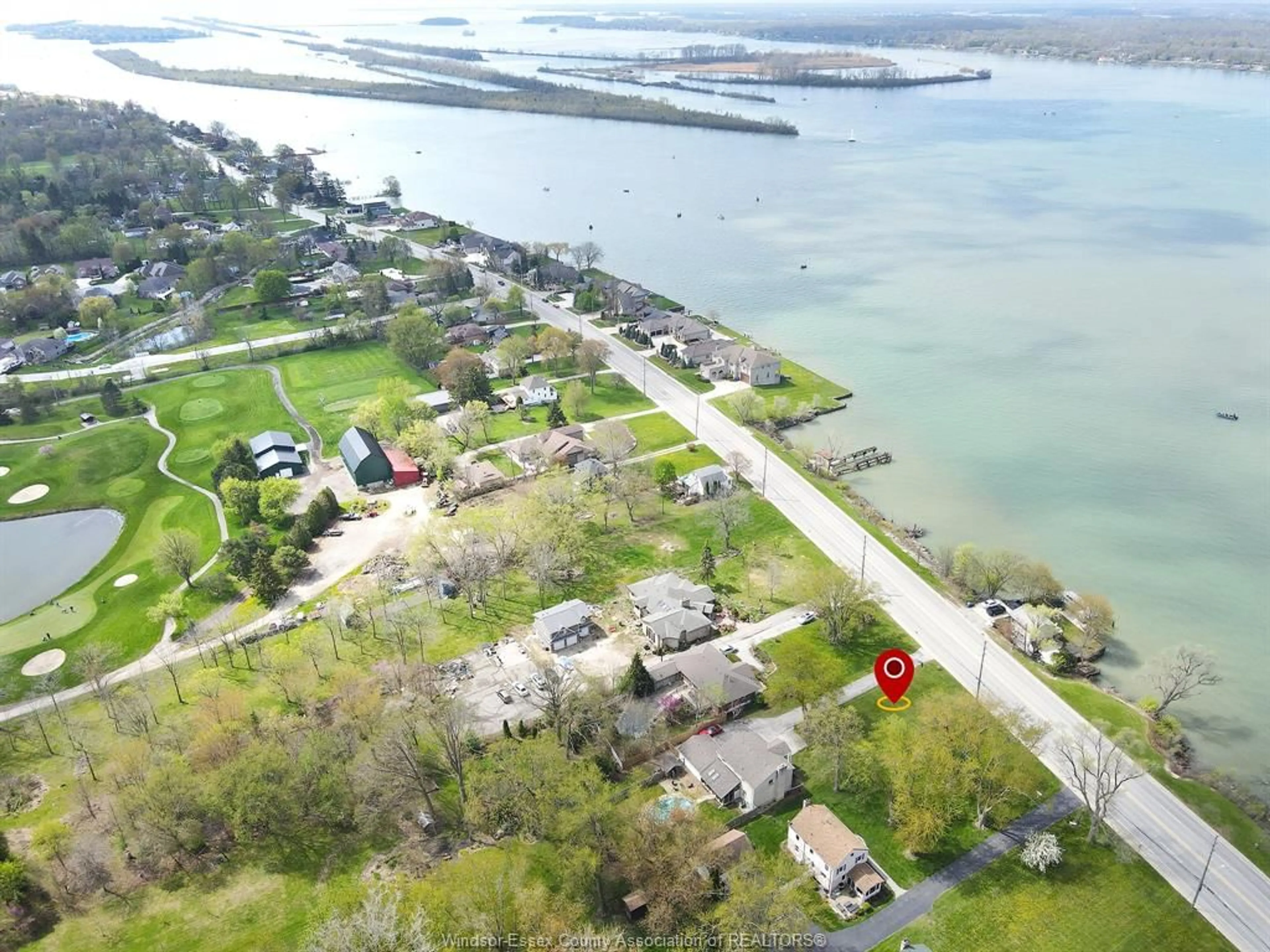 A pic from outside/outdoor area/front of a property/back of a property/a pic from drone, water/lake/river/ocean view for 885 FRONT RD. NORTH, Amherstburg Ontario N9V 2V6
