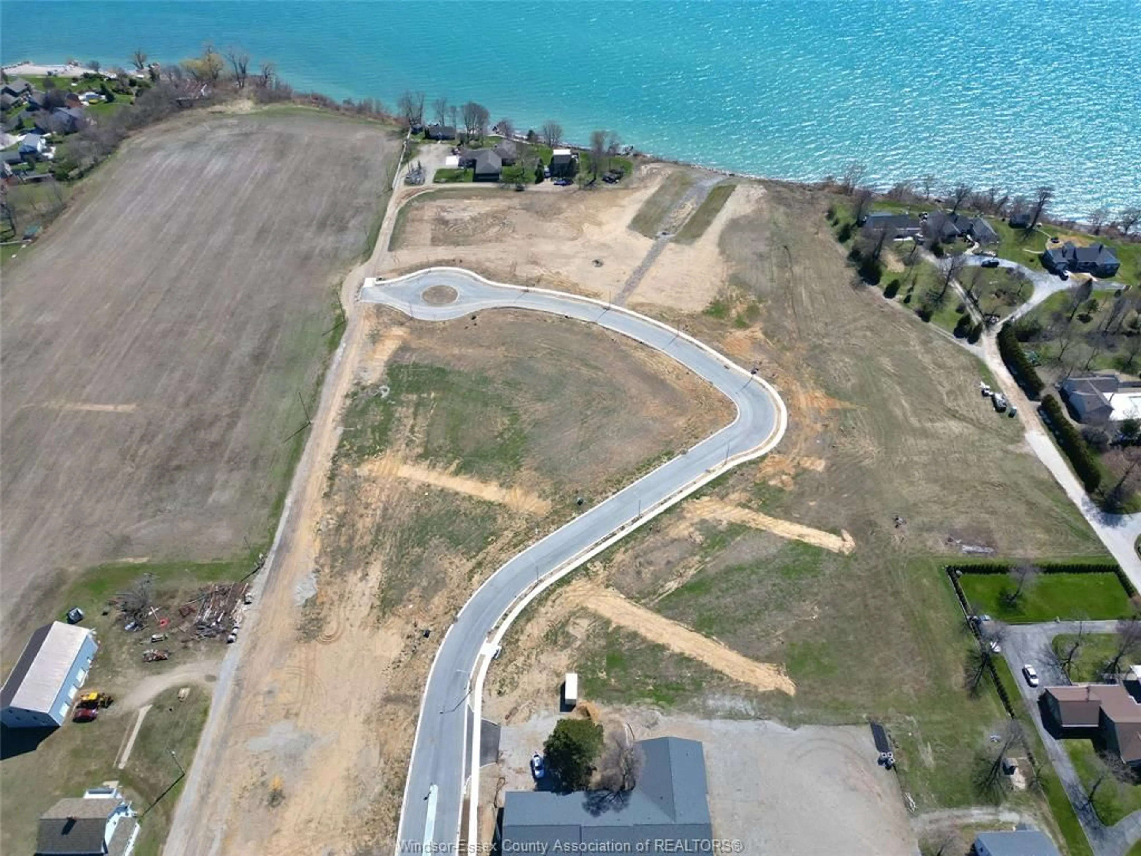 A pic from outside/outdoor area/front of a property/back of a property/a pic from drone, water/lake/river/ocean view for 20 VISTA ISLE Ave, Leamington Ontario N8H 4C9