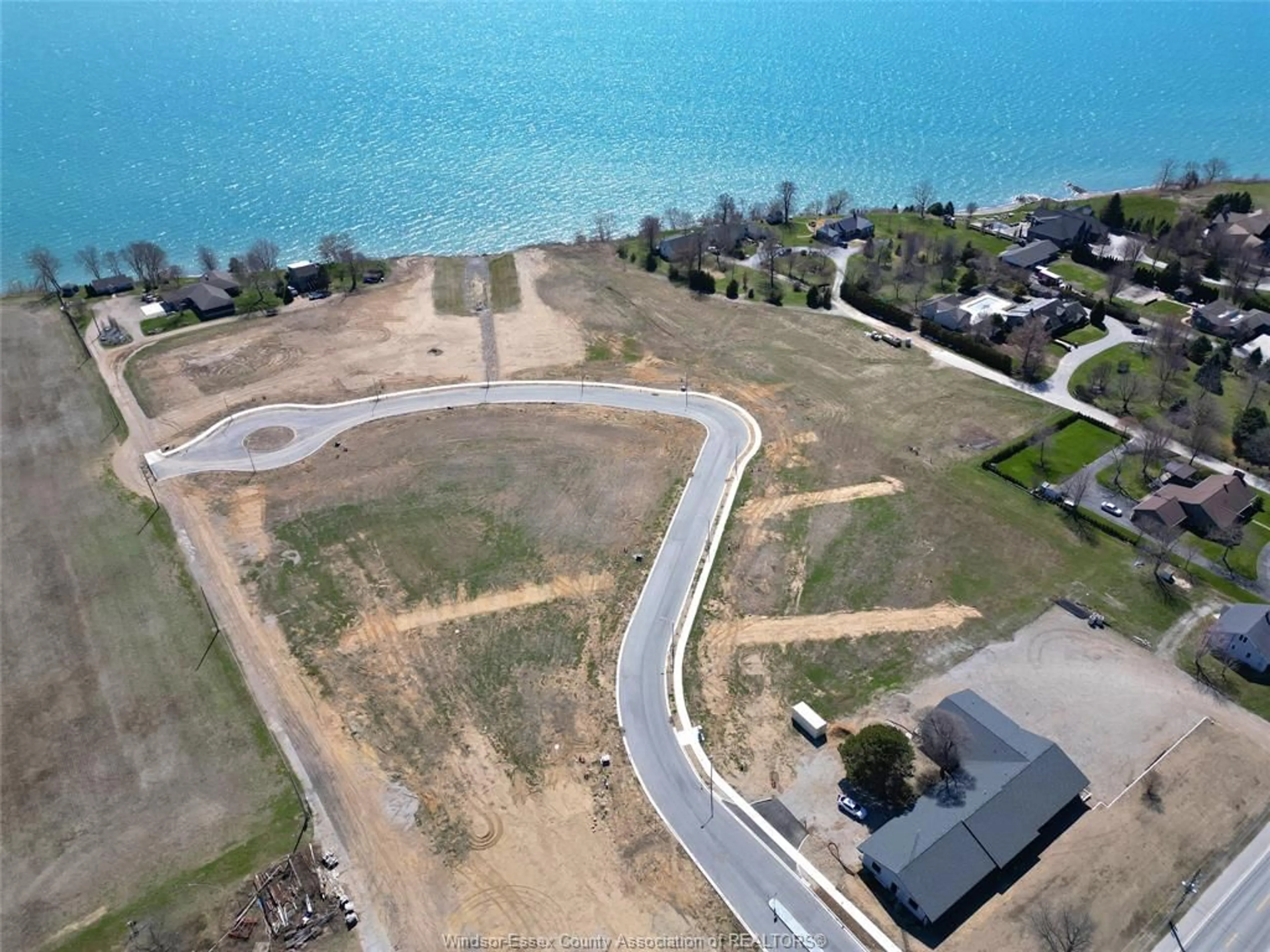 A pic from outside/outdoor area/front of a property/back of a property/a pic from drone, water/lake/river/ocean view for 20 VISTA ISLE Ave, Leamington Ontario N8H 4C9