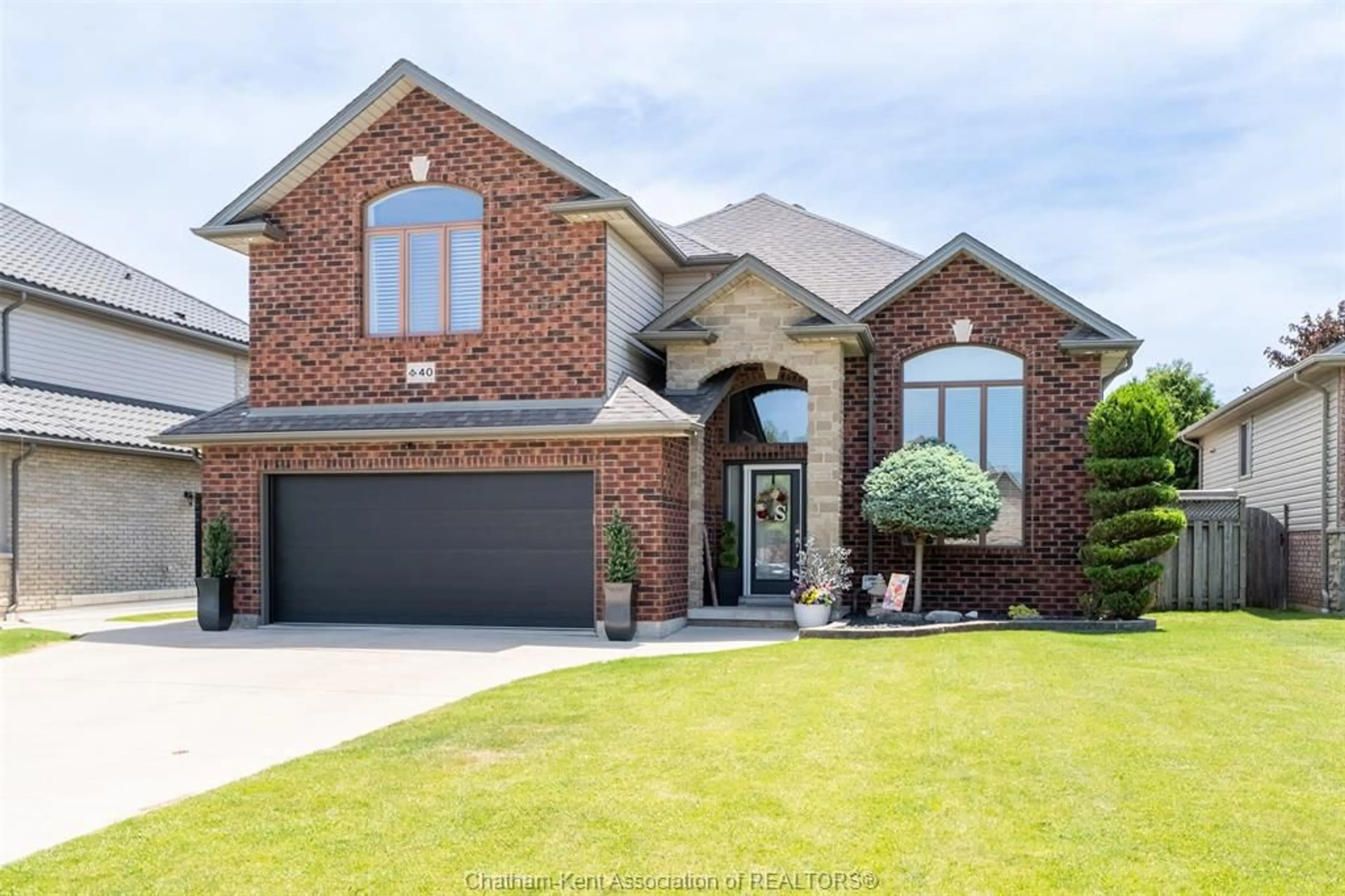 Home with brick exterior material, street for 40 Enclave Pl, Chatham Ontario N7L 5R8