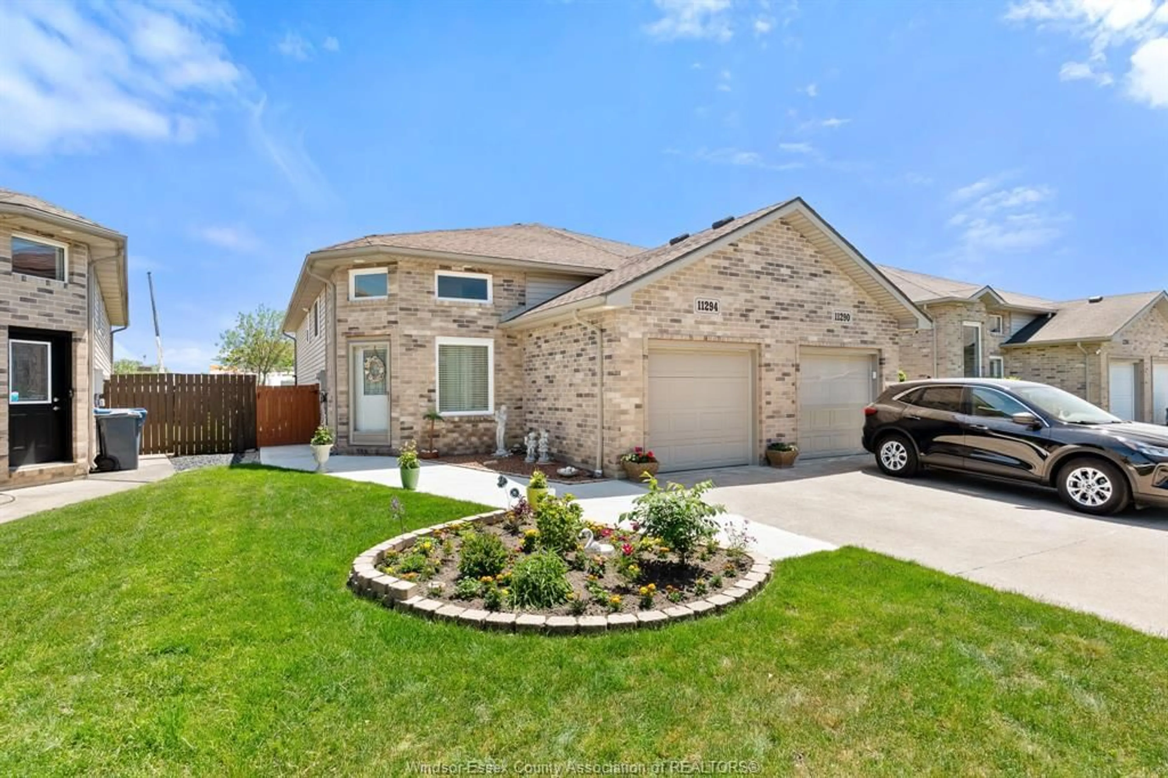 Home with brick exterior material, street for 11294 TIMBER BAY Cres, Windsor Ontario N8R 2L2