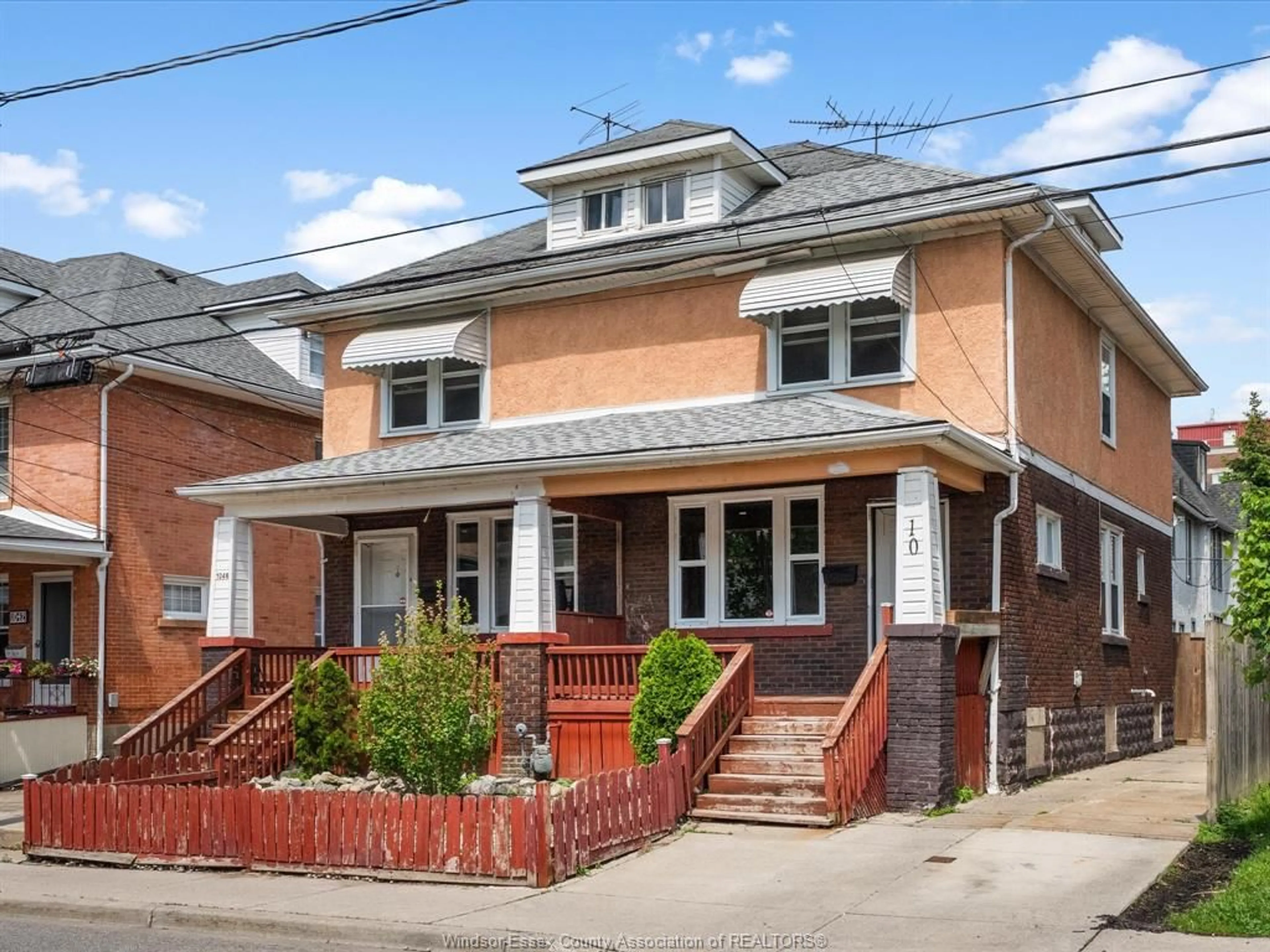 Home with brick exterior material, street for 1046-1048 Pelissier, Windsor Ontario N9A 4L7