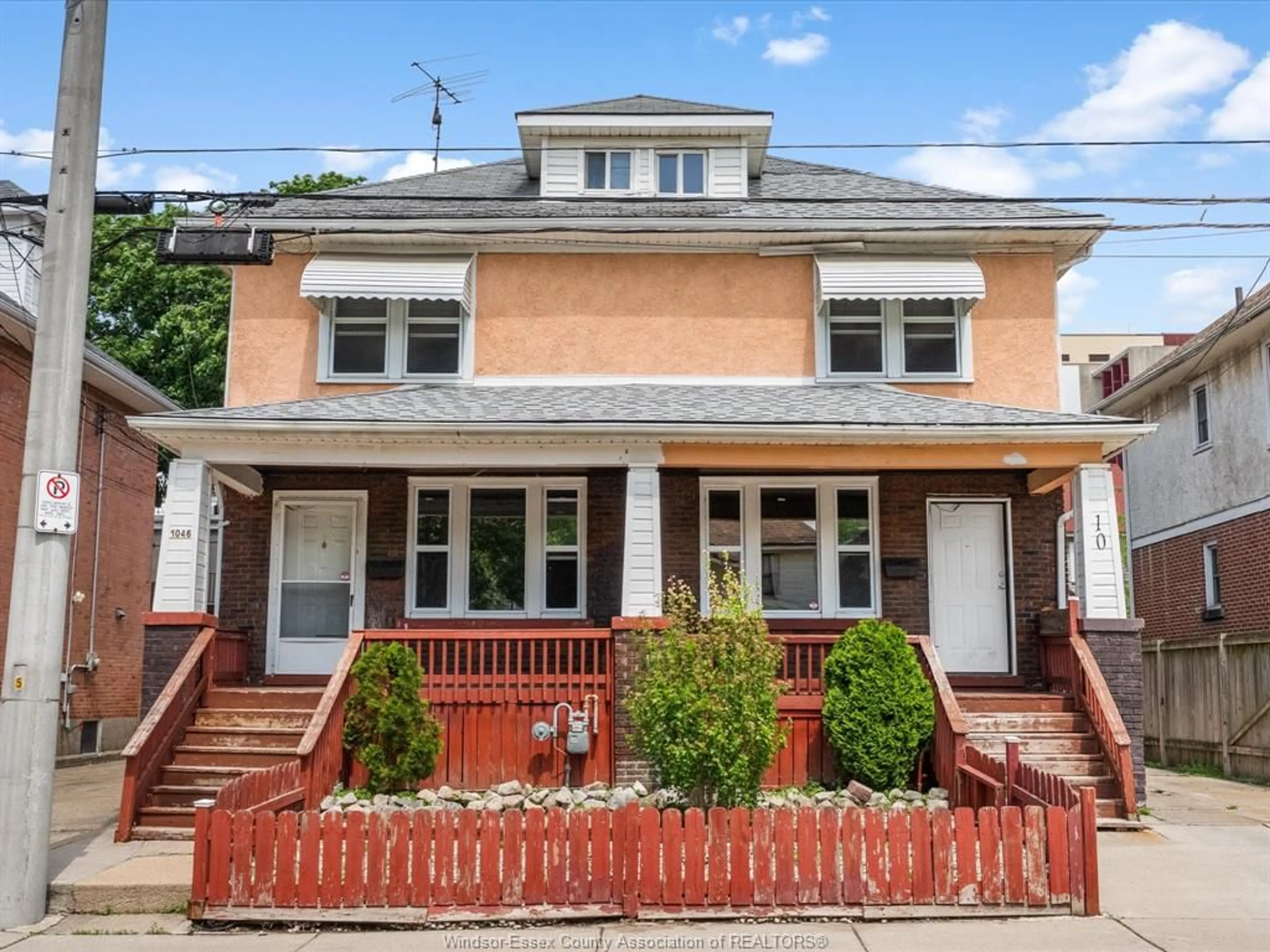 Home with brick exterior material, street for 1046-1048 Pelissier, Windsor Ontario N9A 4L7