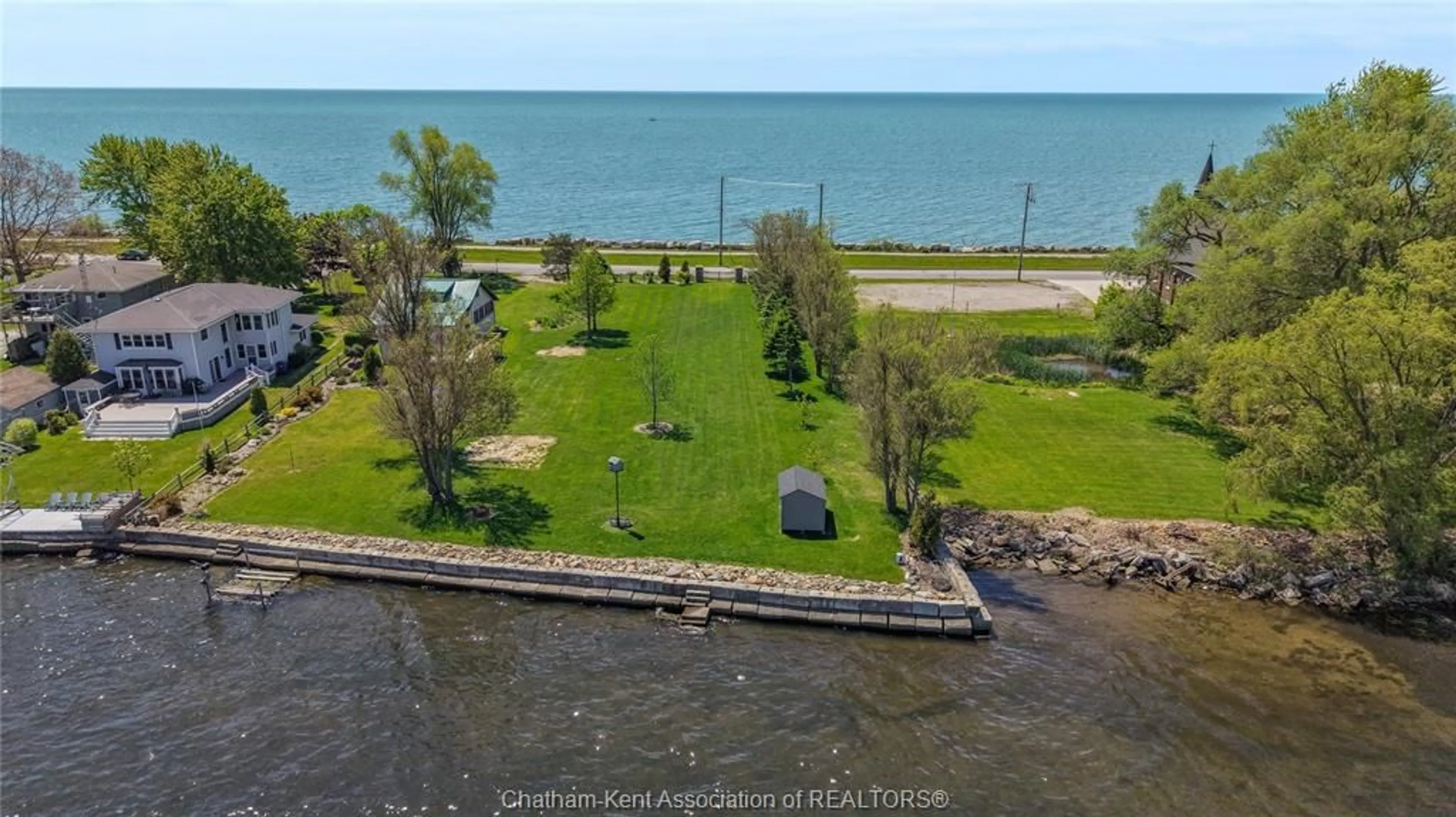 A pic from outside/outdoor area/front of a property/back of a property/a pic from drone, water/lake/river/ocean view for 100 ROSS Lane, Erieau Ontario N0P 1N0