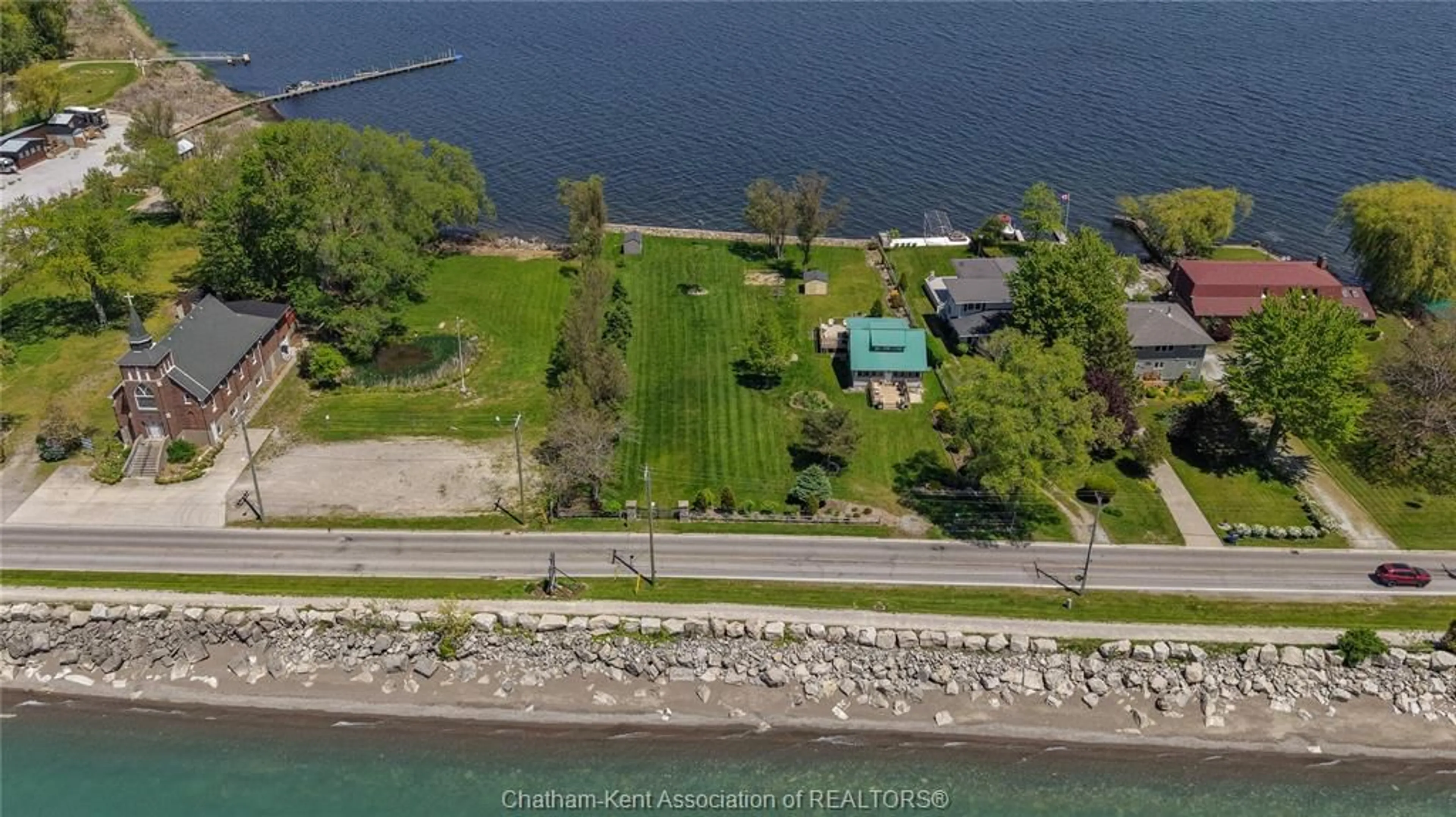 A pic from outside/outdoor area/front of a property/back of a property/a pic from drone, water/lake/river/ocean view for 100 ROSS Lane, Erieau Ontario N0P 1N0