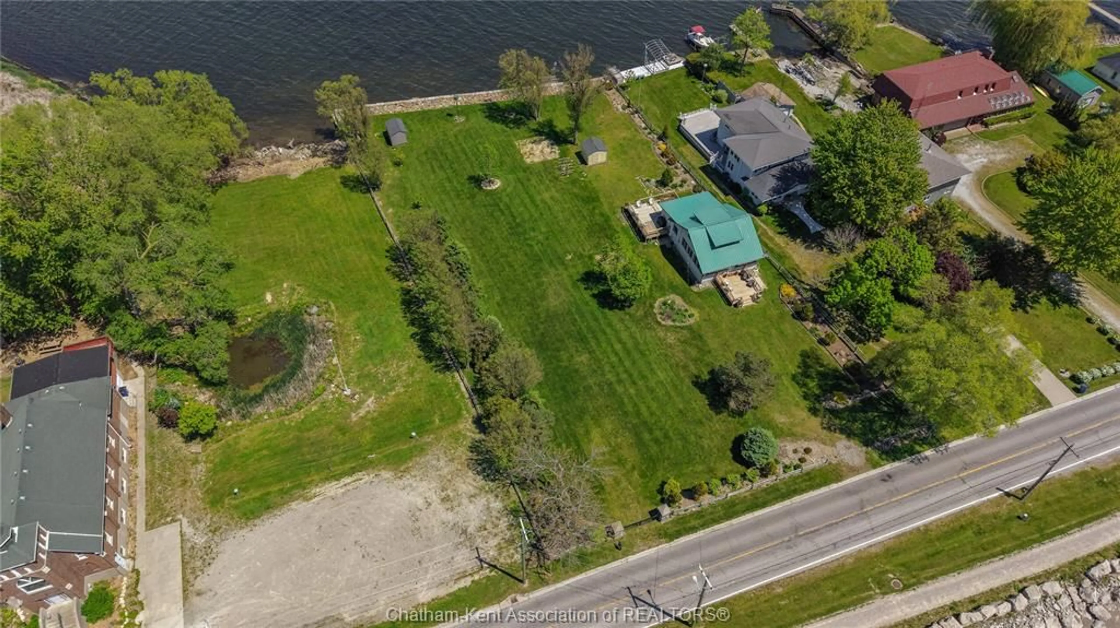 A pic from outside/outdoor area/front of a property/back of a property/a pic from drone, water/lake/river/ocean view for 100 ROSS Lane, Erieau Ontario N0P 1N0