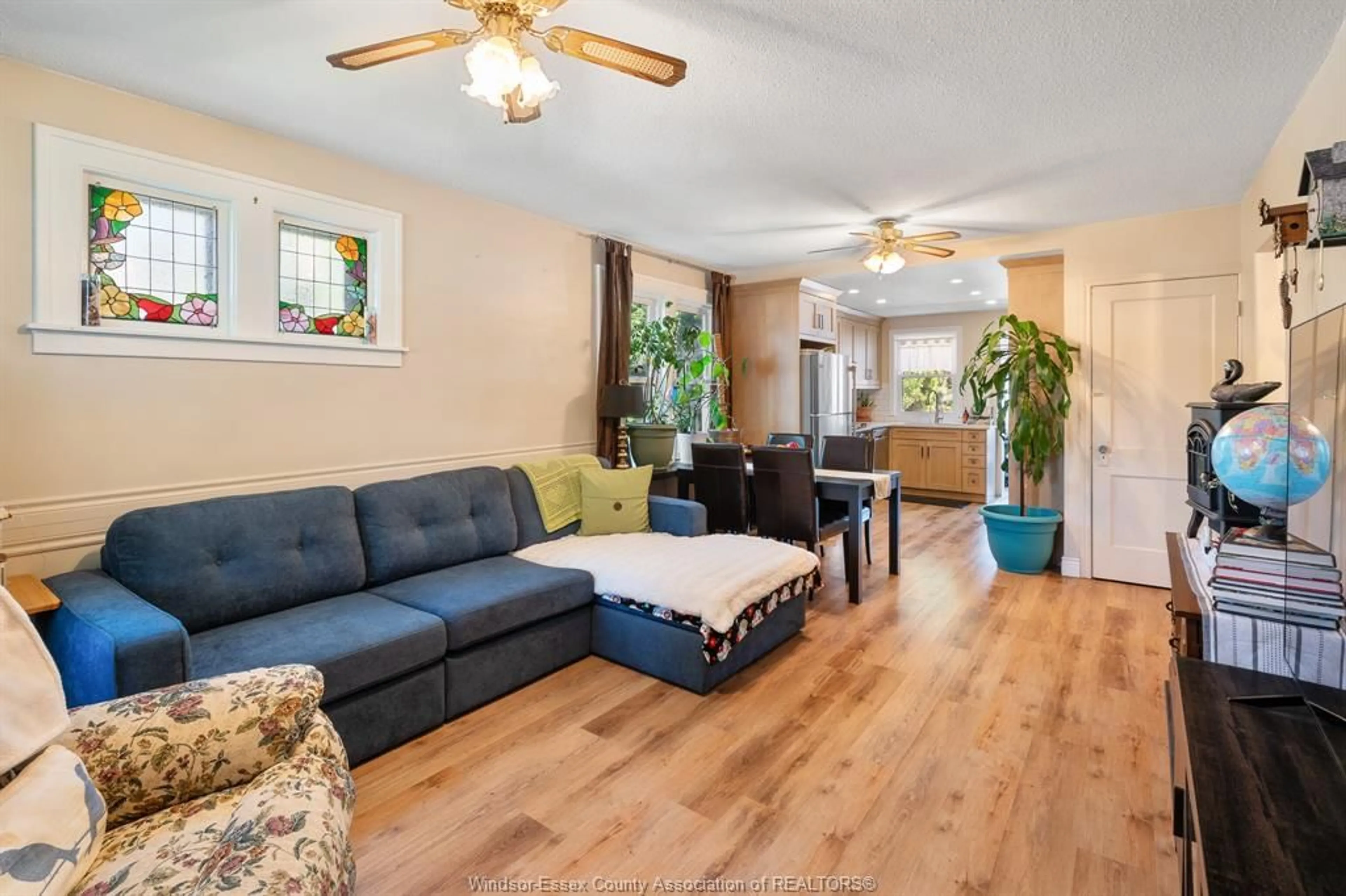Living room with furniture, wood/laminate floor for 1220 BRUCE Ave, Windsor Ontario N8X 1X3
