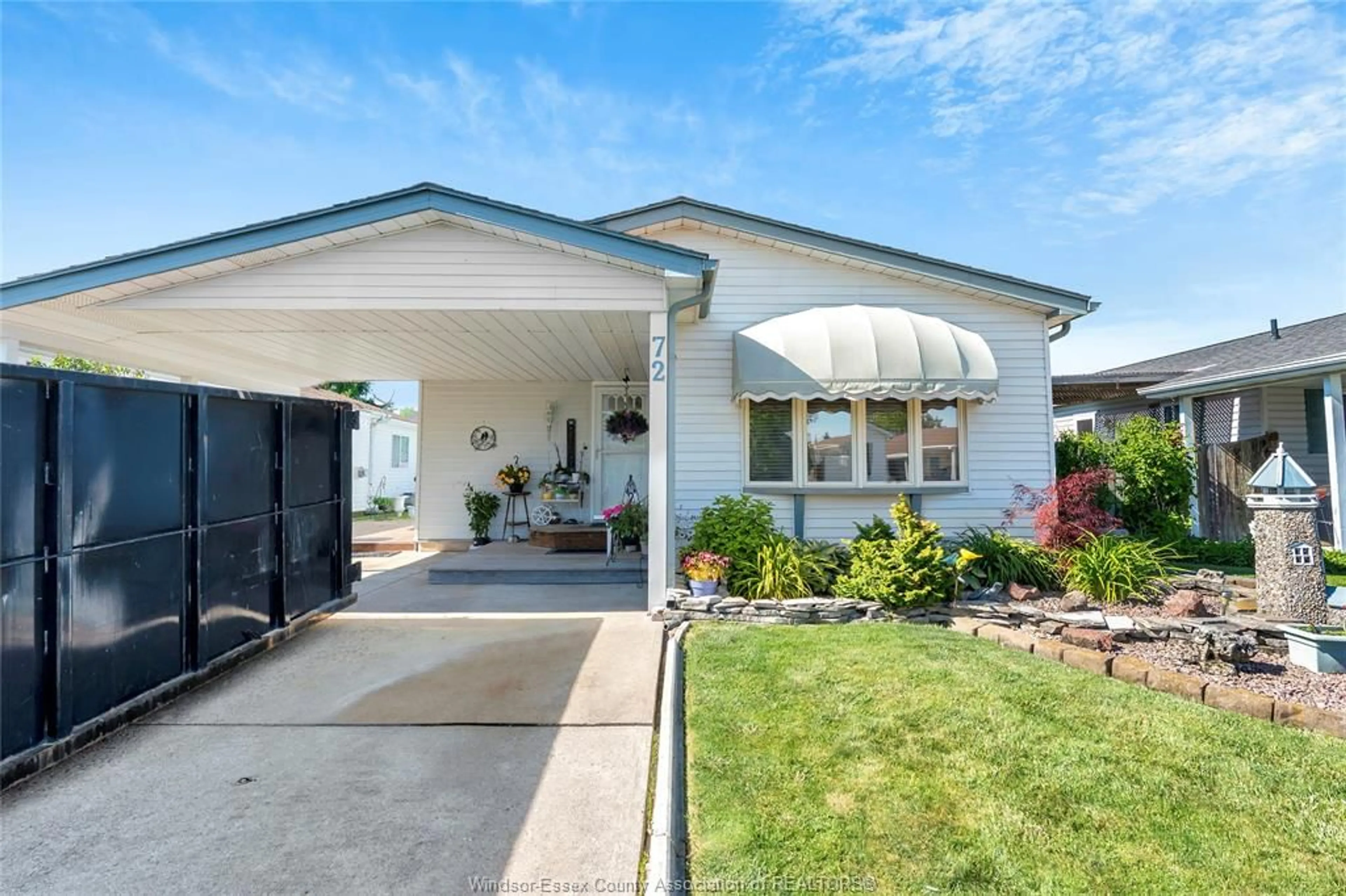 Home with vinyl exterior material, street for 72 CHERRY St, McGregor Ontario N0R 1J0