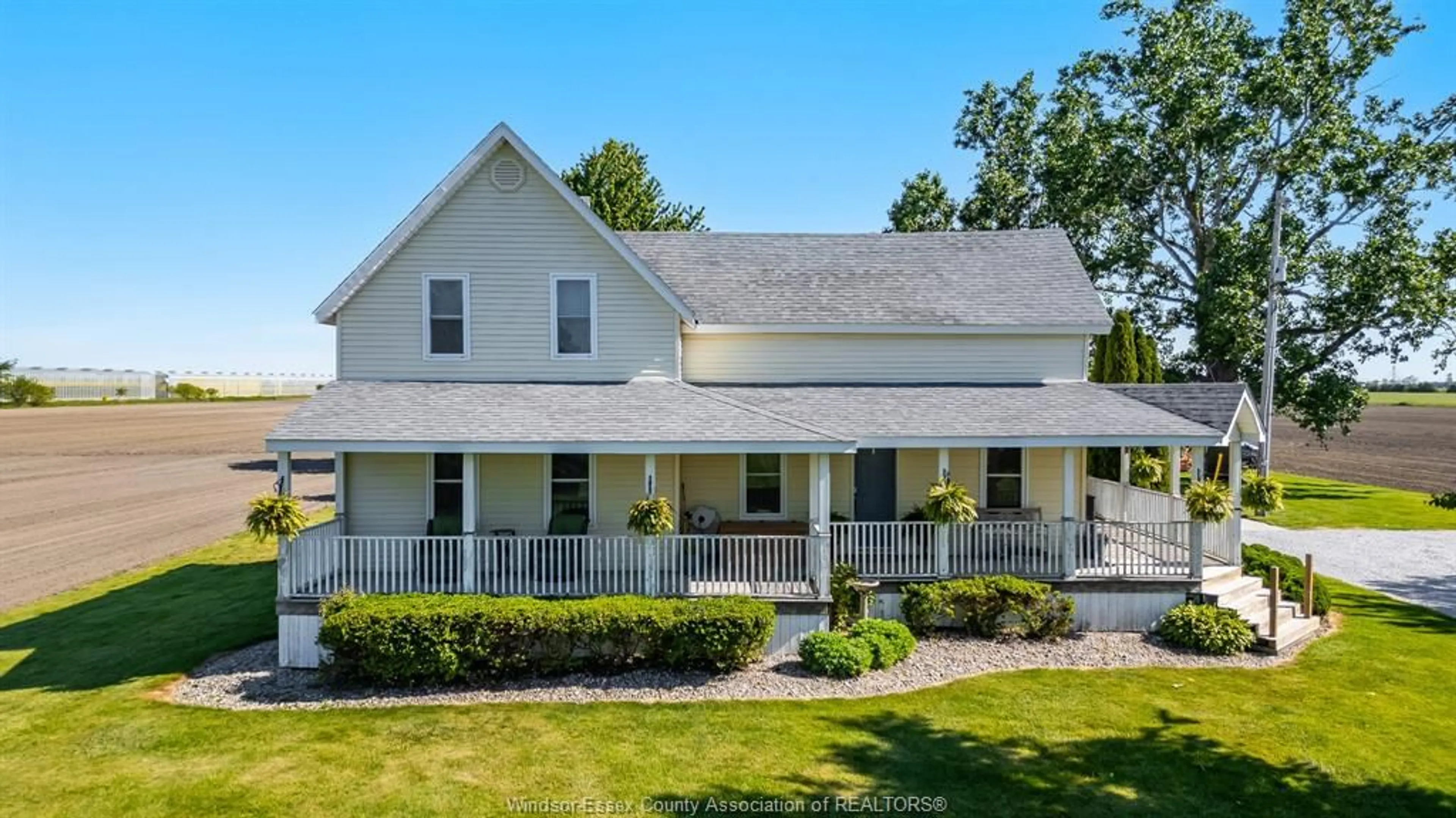 A pic from outside/outdoor area/front of a property/back of a property/a pic from drone, unknown for 829 COUNTY RD 14, Leamington Ontario N8H 3V8