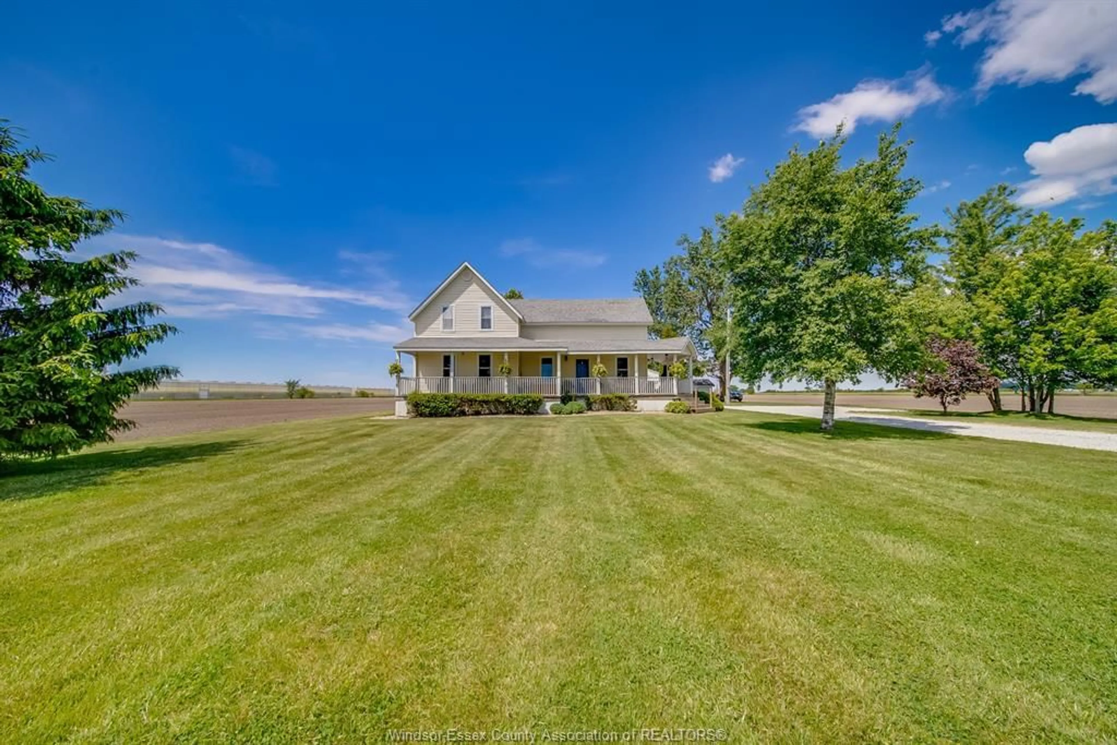 A pic from outside/outdoor area/front of a property/back of a property/a pic from drone, water/lake/river/ocean view for 829 COUNTY RD 14, Leamington Ontario N8H 3V8
