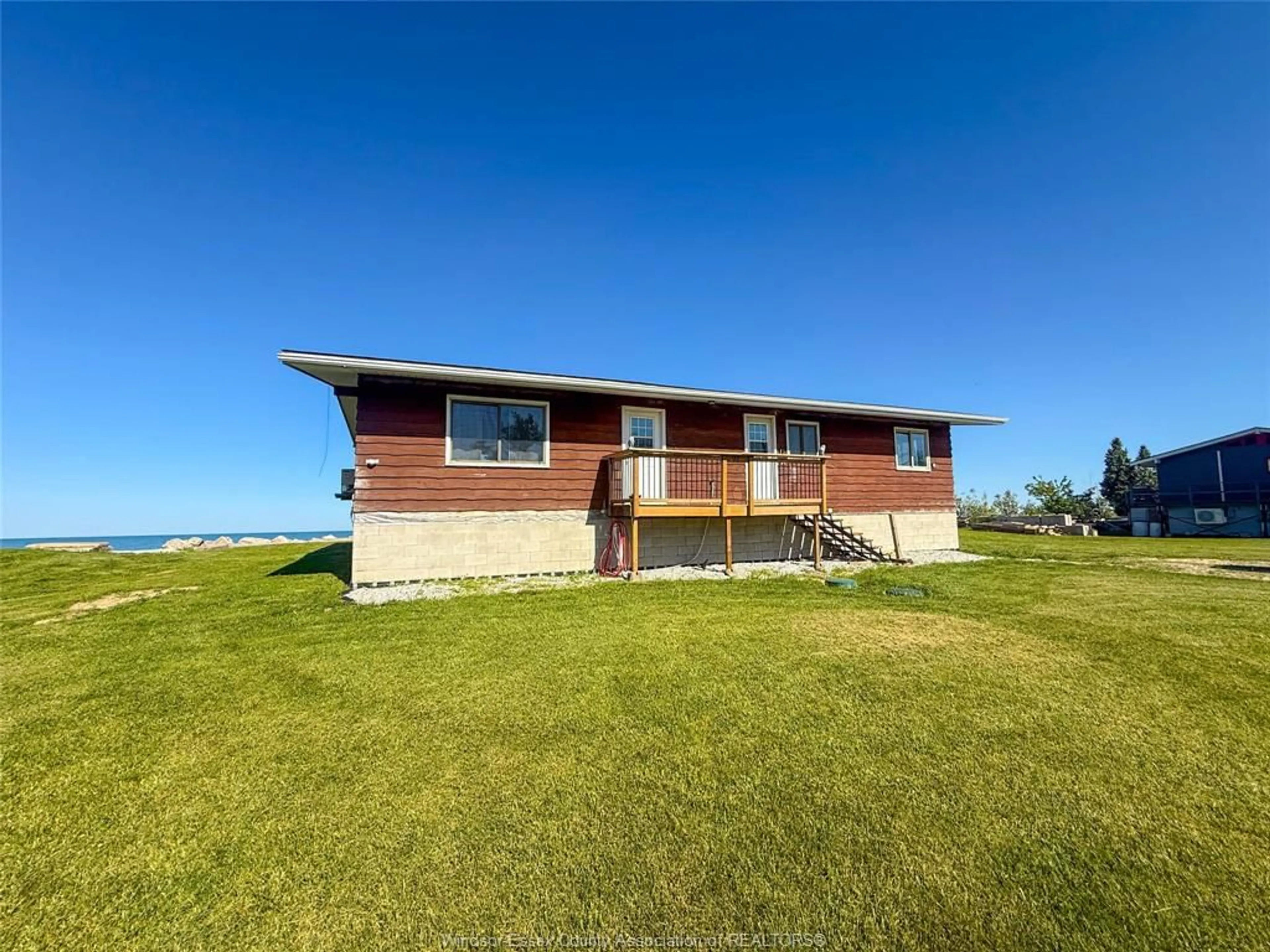A pic from outside/outdoor area/front of a property/back of a property/a pic from drone, water/lake/river/ocean view for 91 MARENTETTE BEACH Rd, Leamington Ontario N8H 3V7