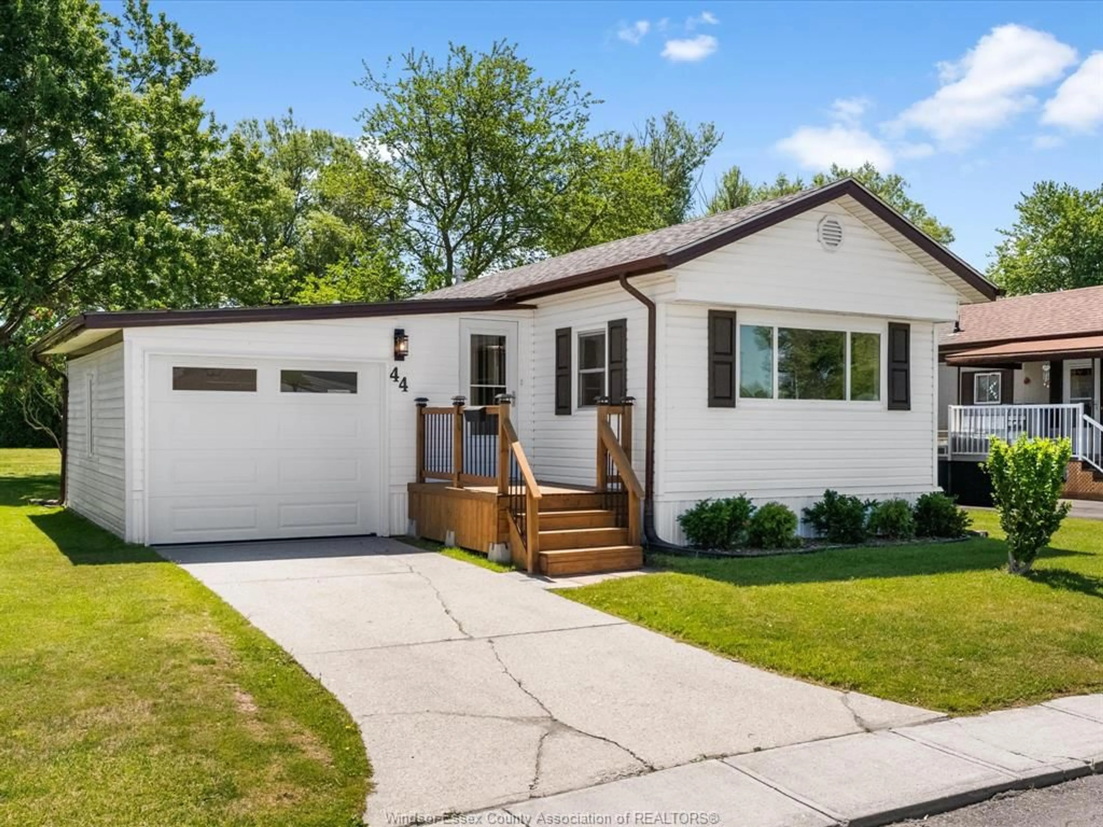 Home with vinyl exterior material, street for 44 Miriam Crt, Essex Ontario N8M 1Z2