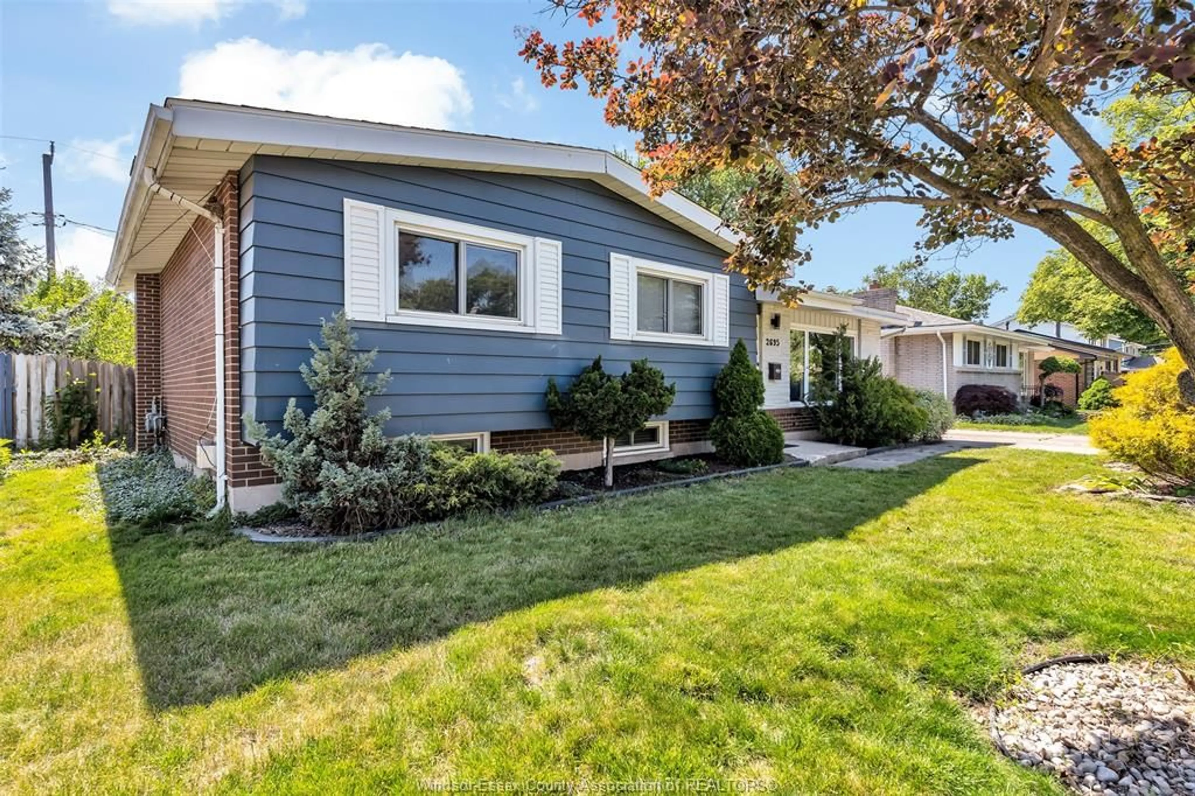 Home with vinyl exterior material, street for 2695 SIERRA Dr, Windsor Ontario N9E 2Y9