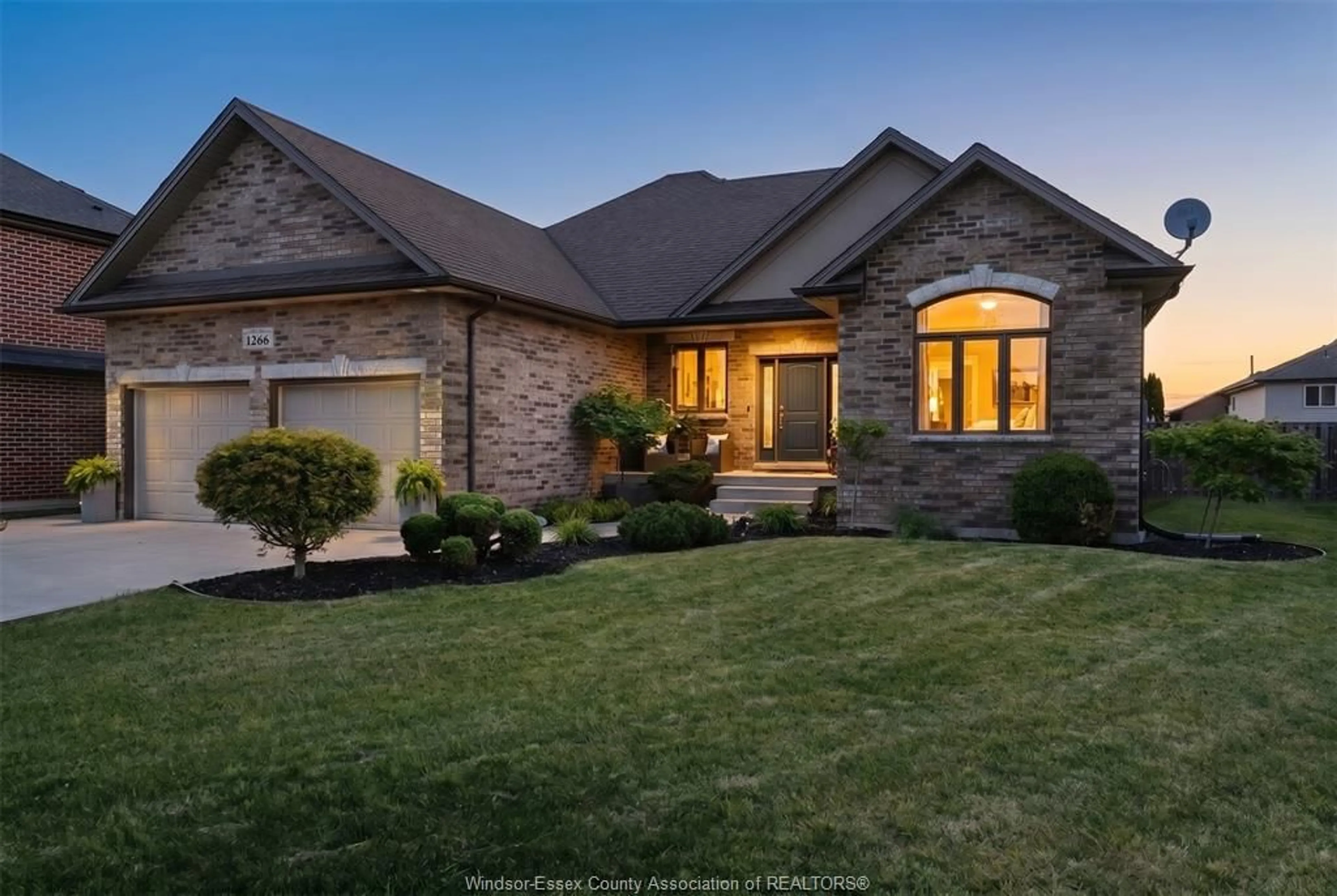 Home with brick exterior material, street for 1266 DEER RUN Trail, Lakeshore Ontario N8L 0S8