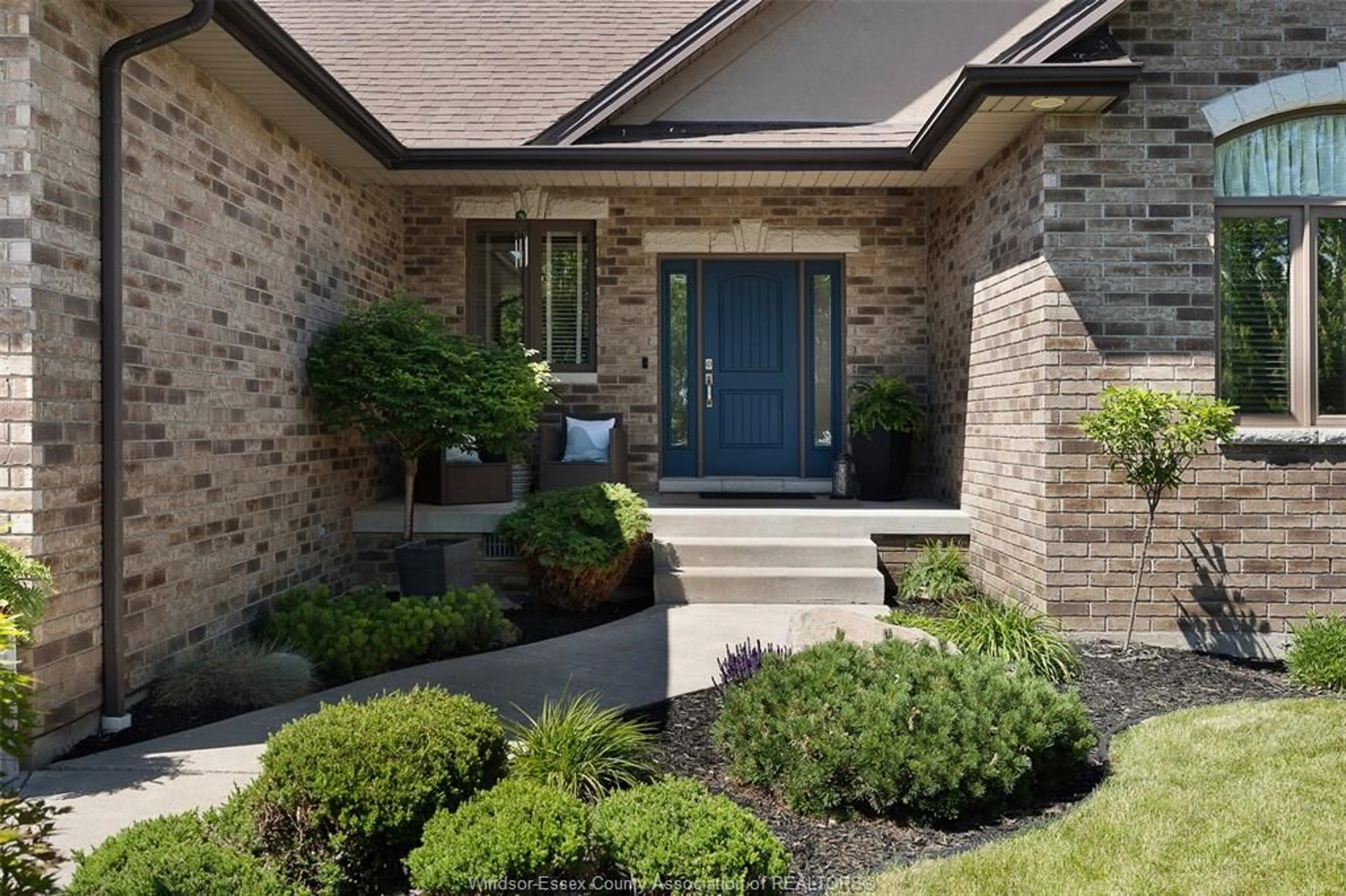 Home with brick exterior material, street for 1266 DEER RUN Trail, Lakeshore Ontario N8L 0S8