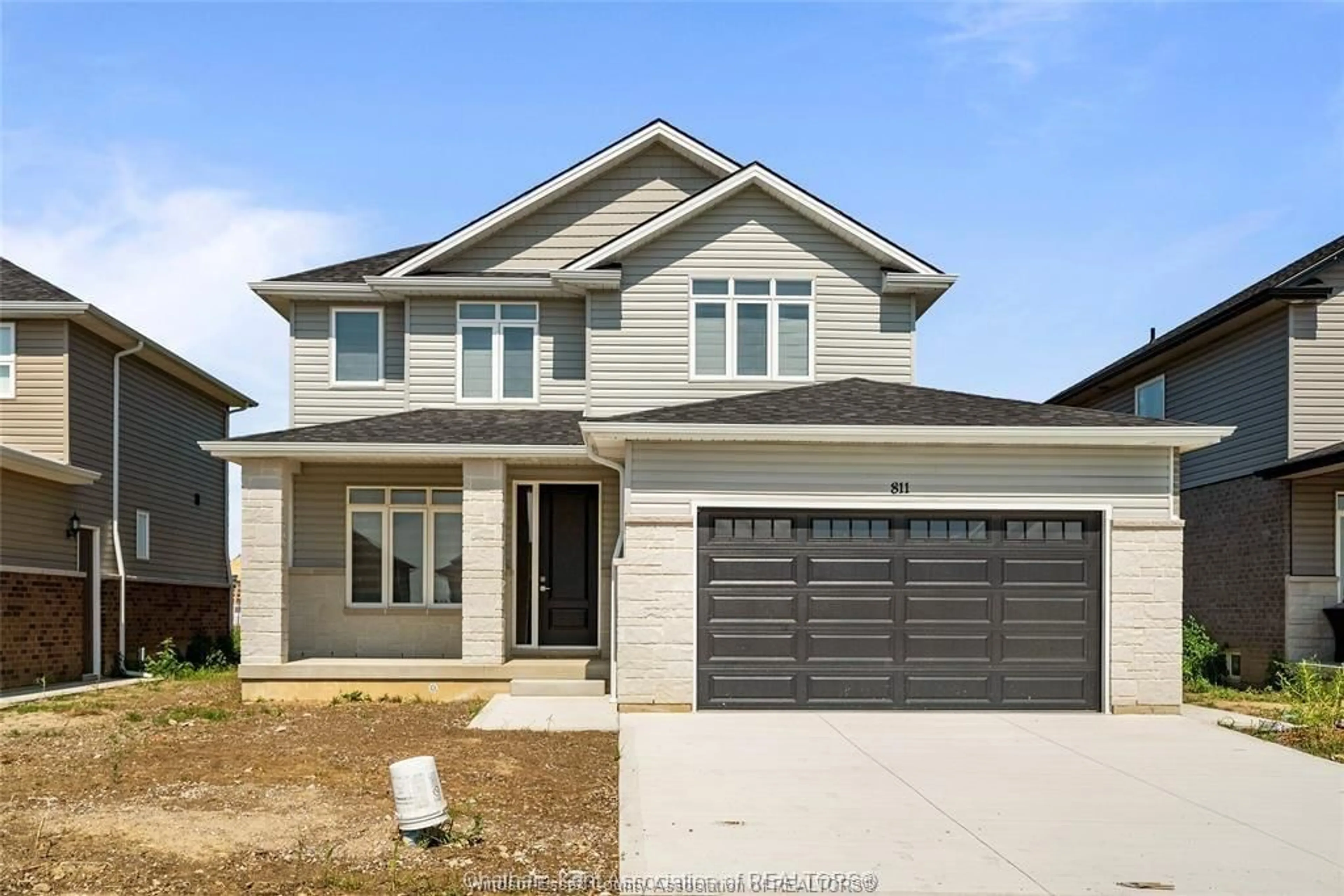 Home with vinyl exterior material, street for 811 KEIL Dr, Chatham Ontario N7M 0T4