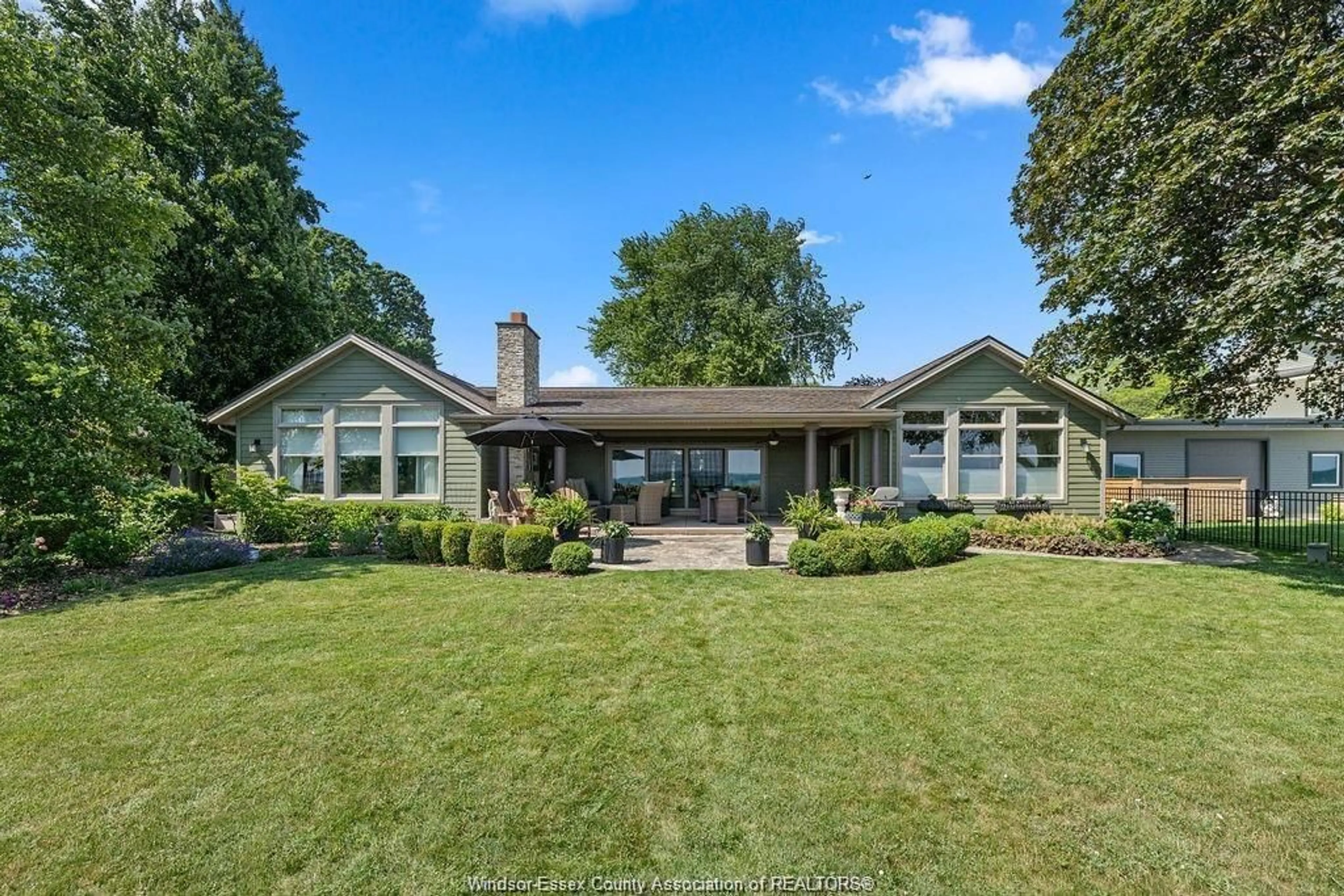A pic from outside/outdoor area/front of a property/back of a property/a pic from drone, water/lake/river/ocean view for 1695 HERITAGE, Kingsville Ontario N9Y 2E6