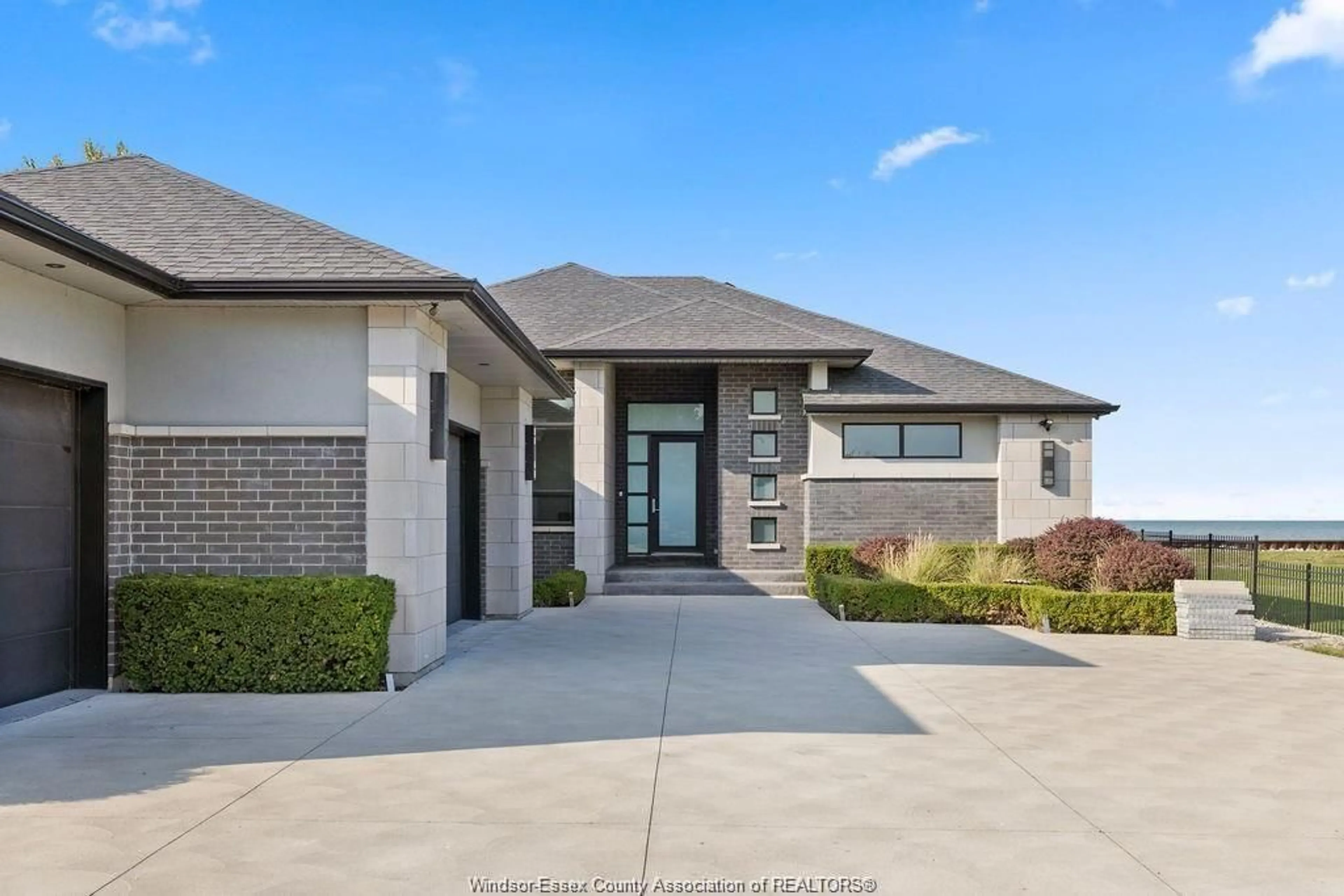 Home with brick exterior material, street for 371 CHARRON BEACH, Lakeshore Ontario N8L 0G2
