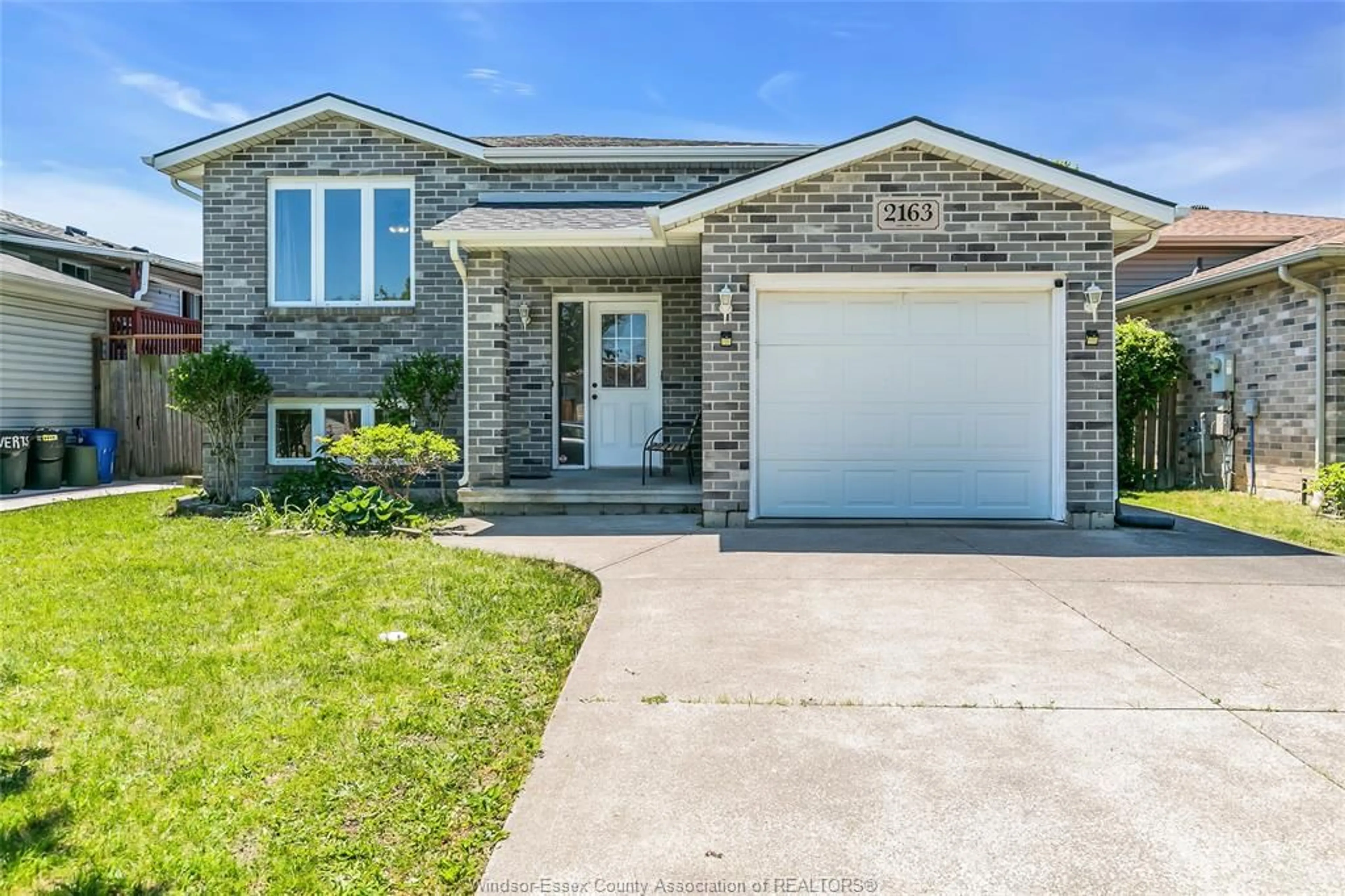 Home with brick exterior material, street for 2163 EVERTS, Windsor Ontario N9B 3X6
