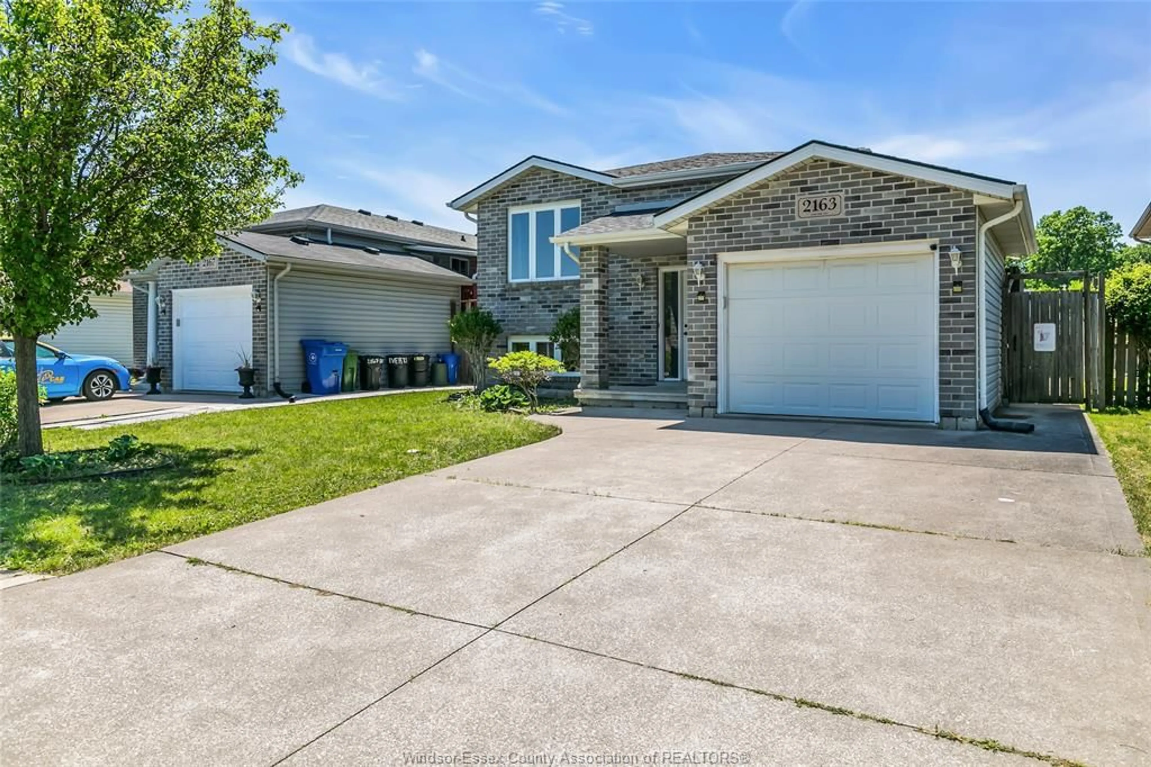 Home with brick exterior material, street for 2163 EVERTS, Windsor Ontario N9B 3X6