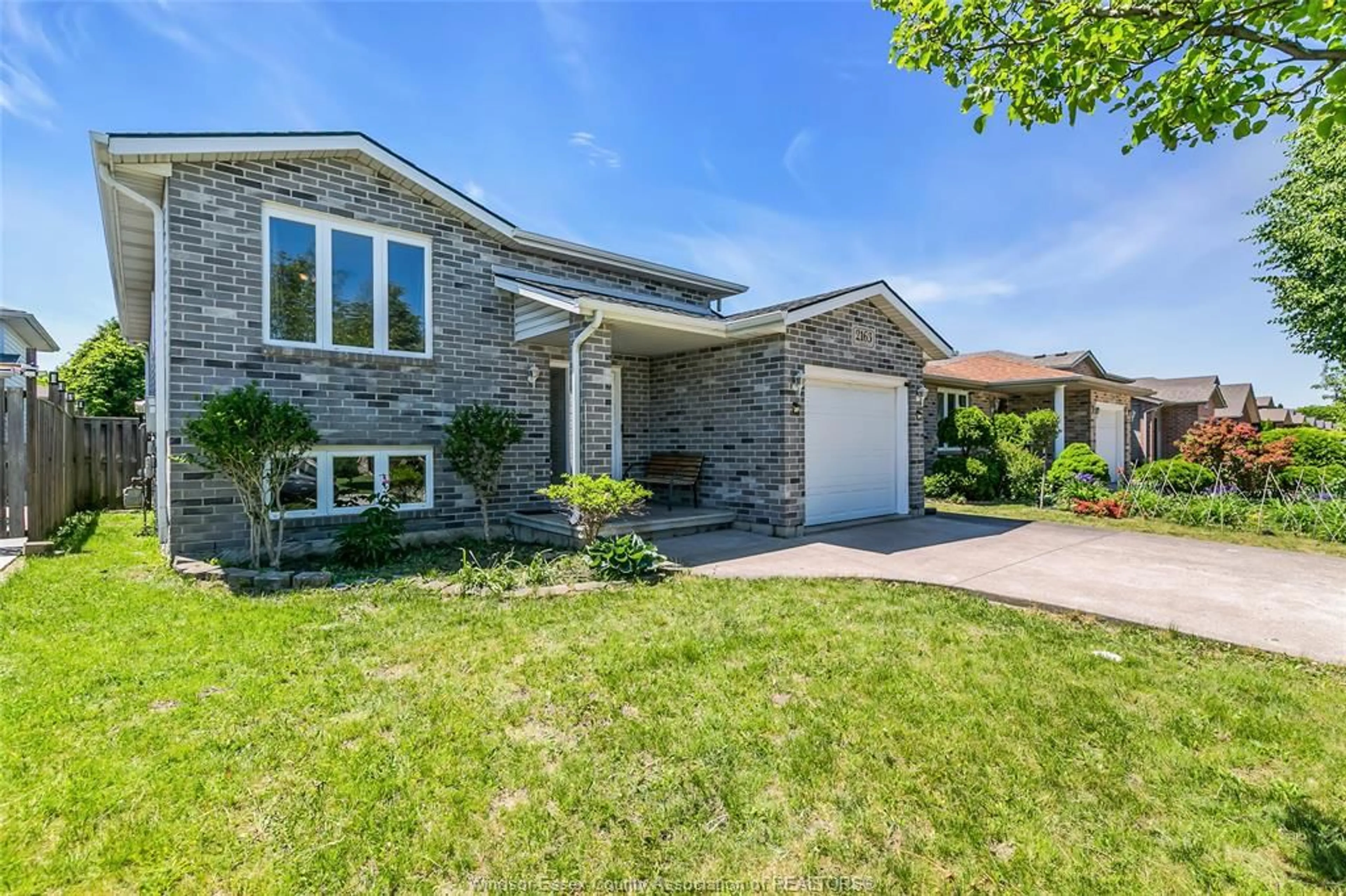 Home with brick exterior material, street for 2163 EVERTS, Windsor Ontario N9B 3X6