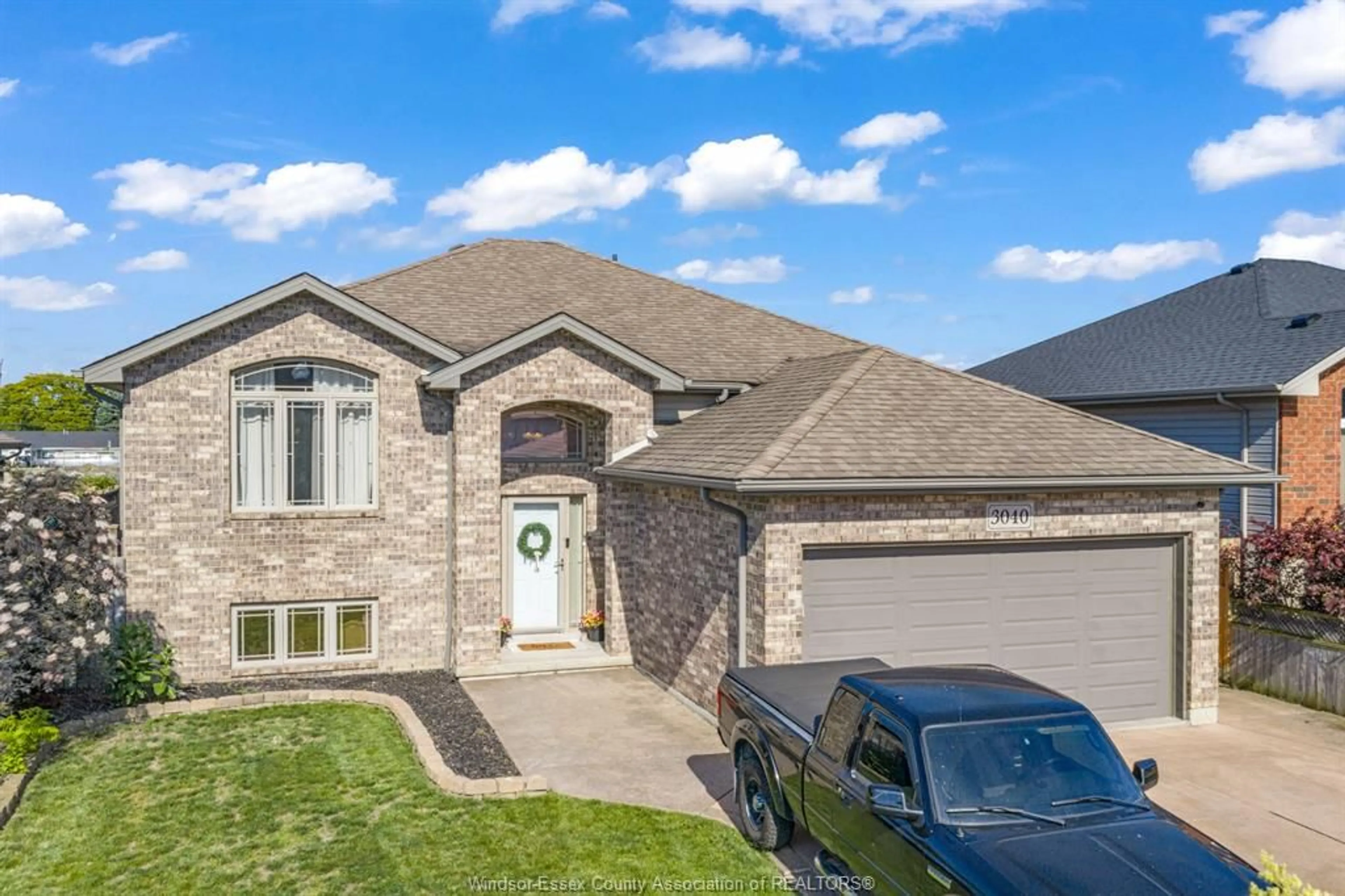 Home with brick exterior material, street for 3040 TROUP Cres, Windsor Ontario N8R 0A5