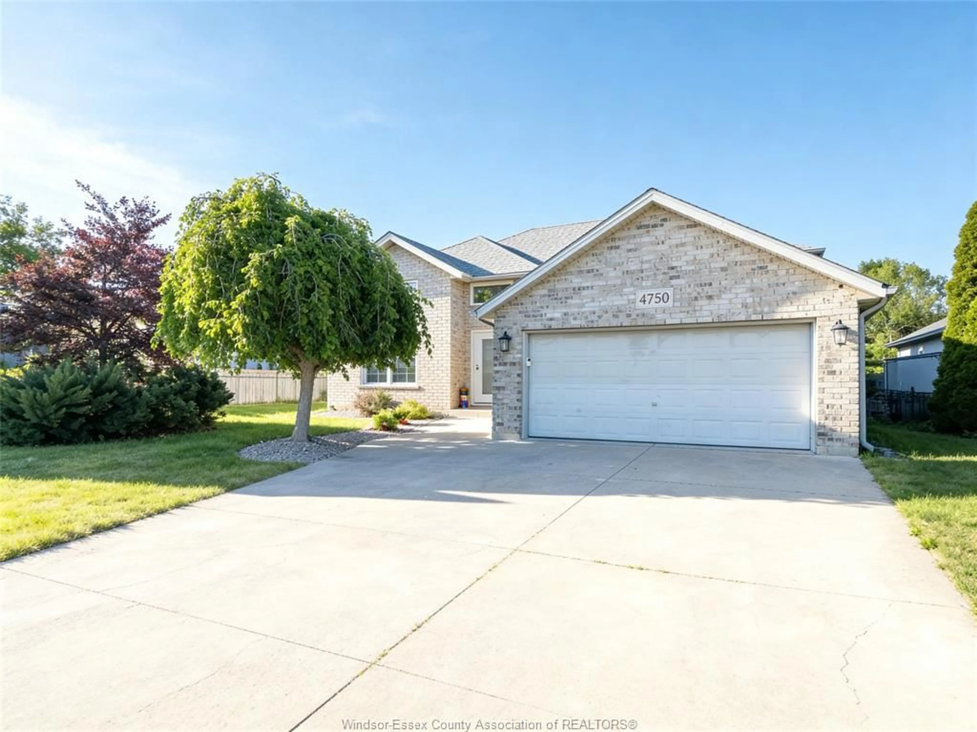 Home with brick exterior material, street for 4750 KOMINAR Crt, Windsor Ontario N9G 2W6