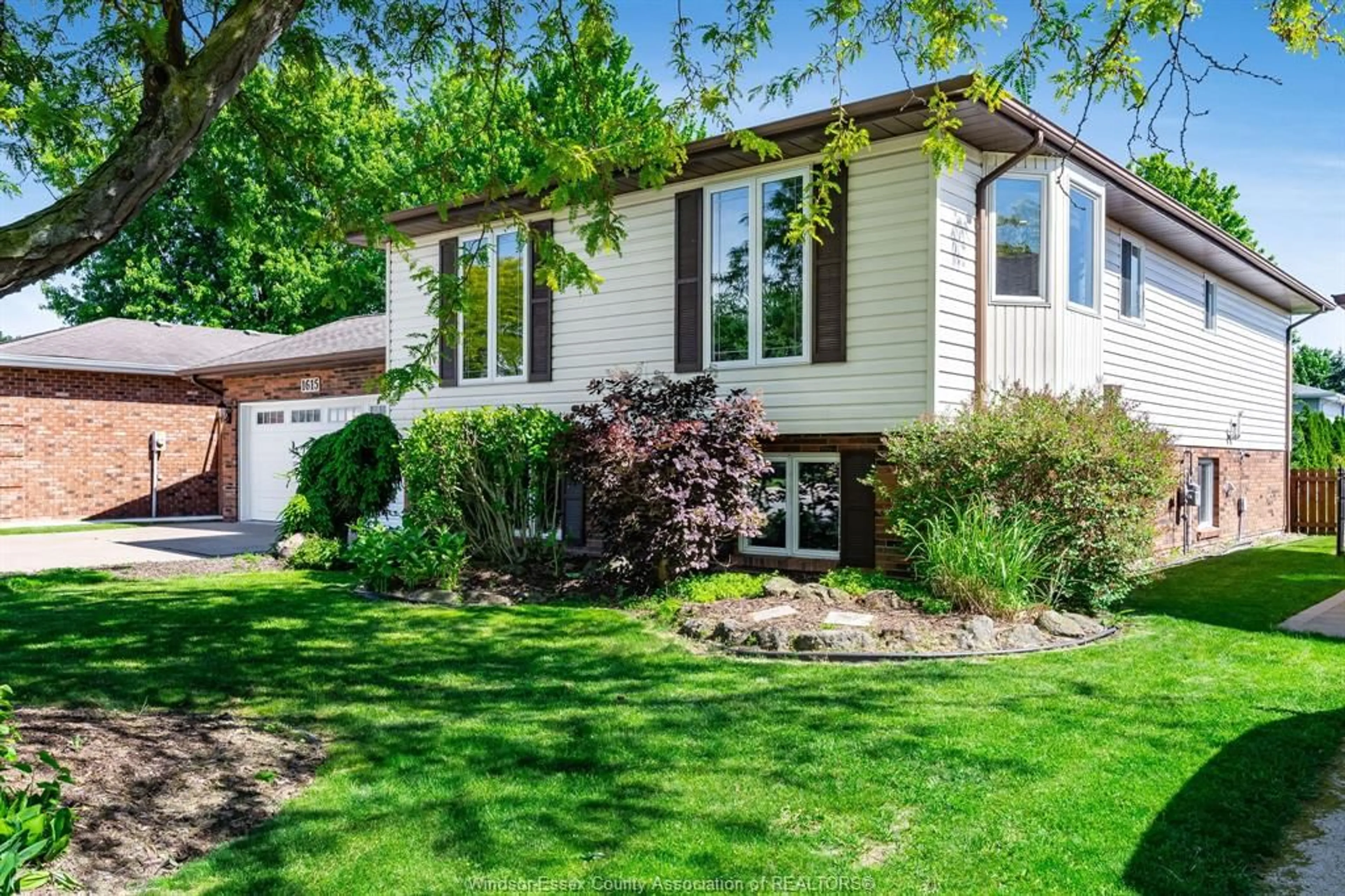 Home with vinyl exterior material, street for 1615 ELMWOOD Ave, Lakeshore Ontario N9C 1Y6