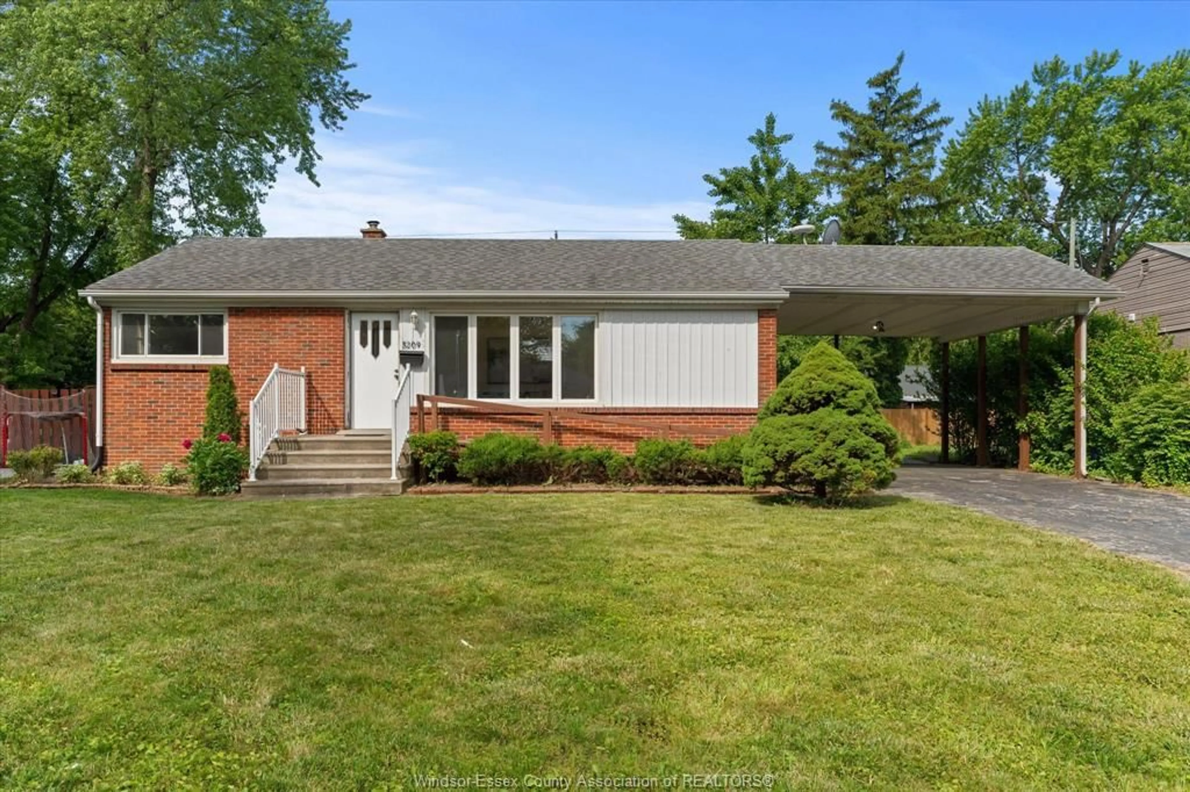Home with brick exterior material, street for 3209 DANDURAND Ave, Windsor Ontario N9E 2E9