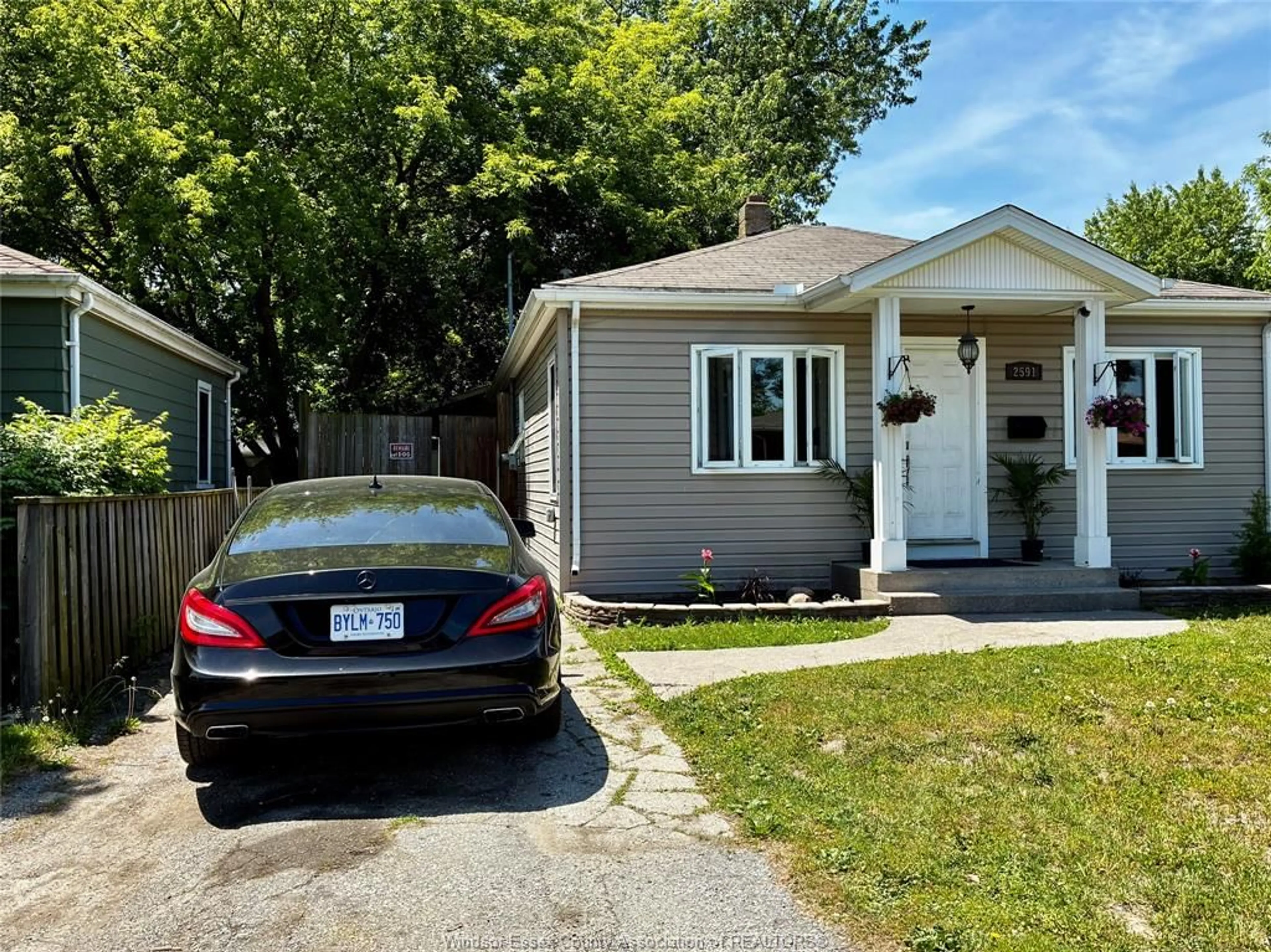 Home with vinyl exterior material, street for 111 MEIGHEN Rd, Windsor Ontario N9A 2S6