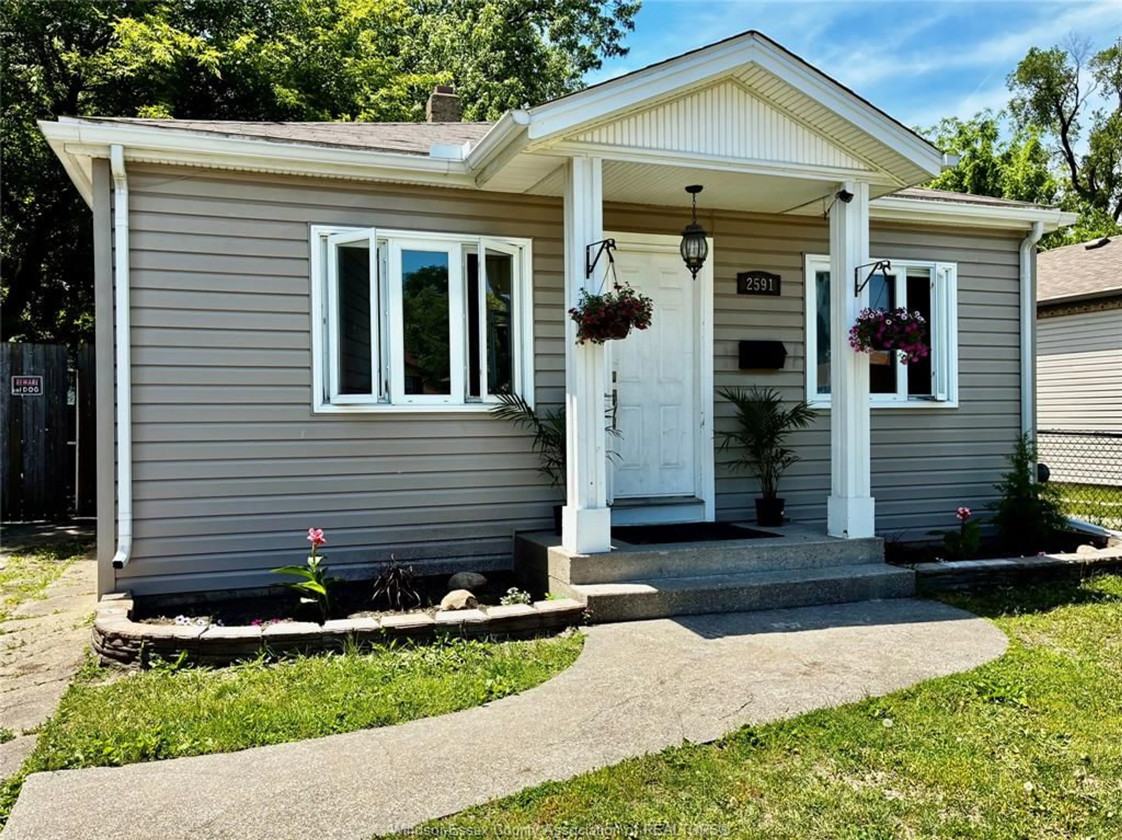 Home with vinyl exterior material, street for 111 MEIGHEN Rd, Windsor Ontario N9A 2S6