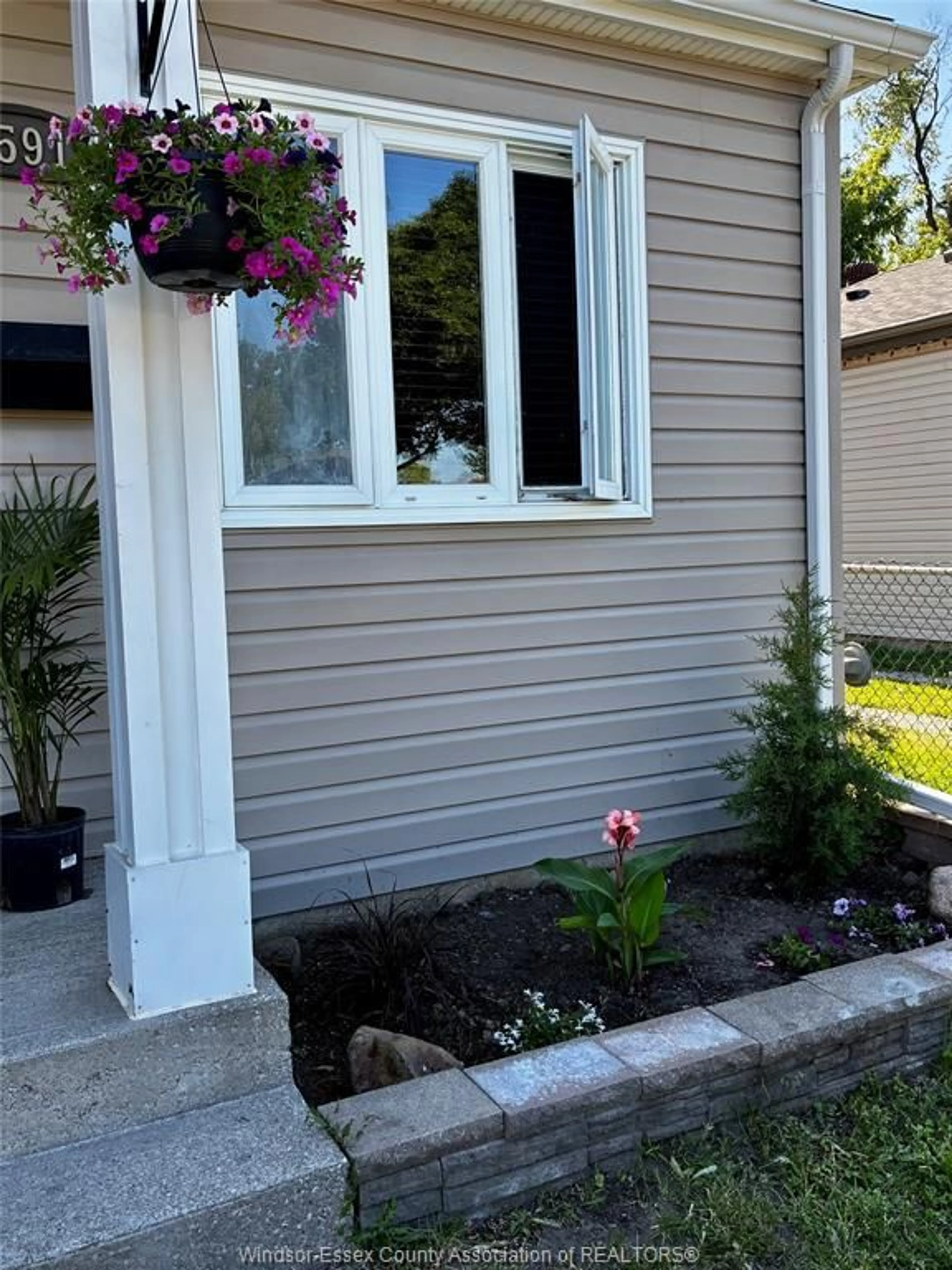 Home with vinyl exterior material, street for 111 MEIGHEN Rd, Windsor Ontario N9A 2S6