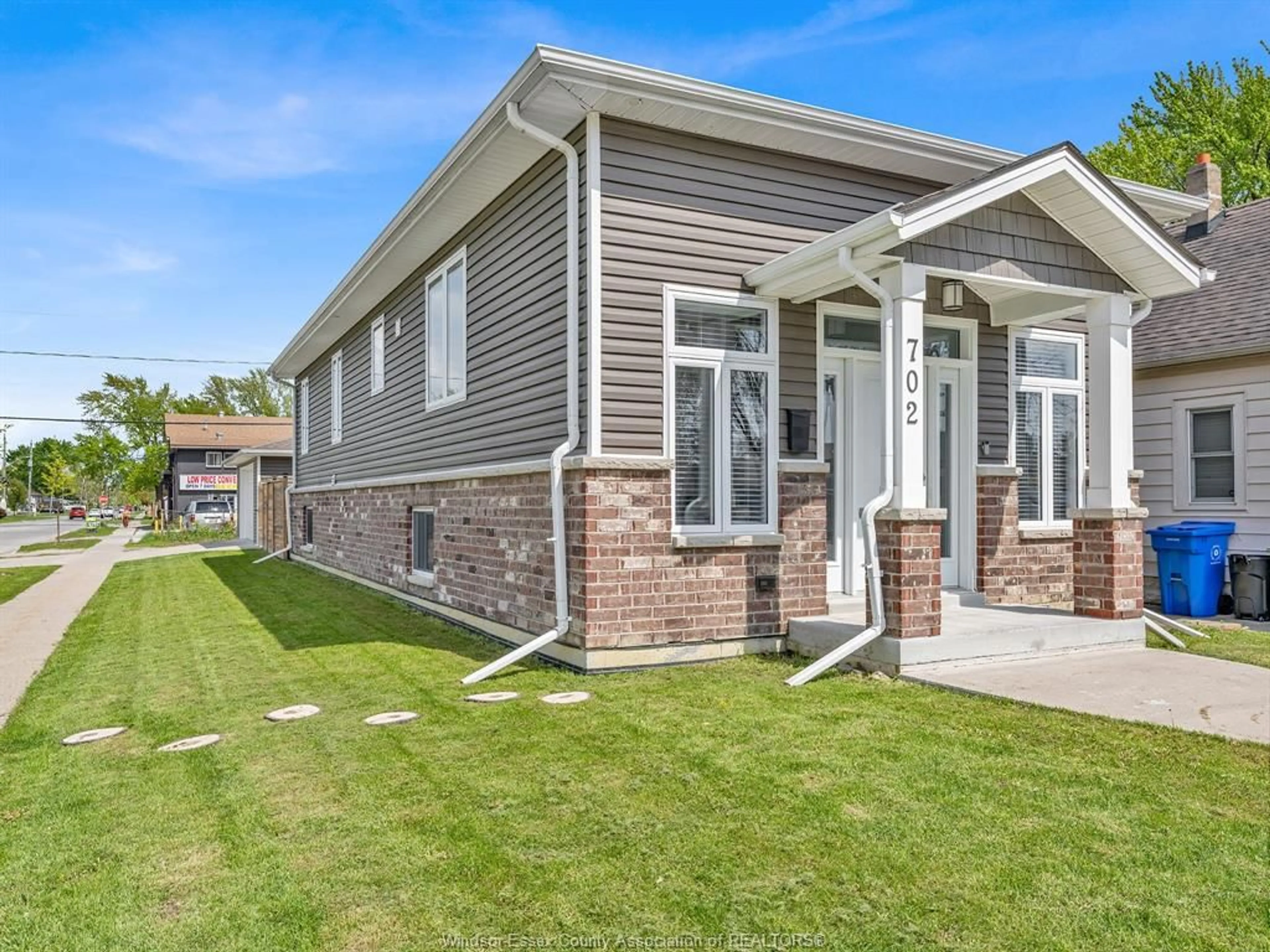 Home with brick exterior material, street for 702 LESPERANCE Rd, Tecumseh Ontario N8N 1W7
