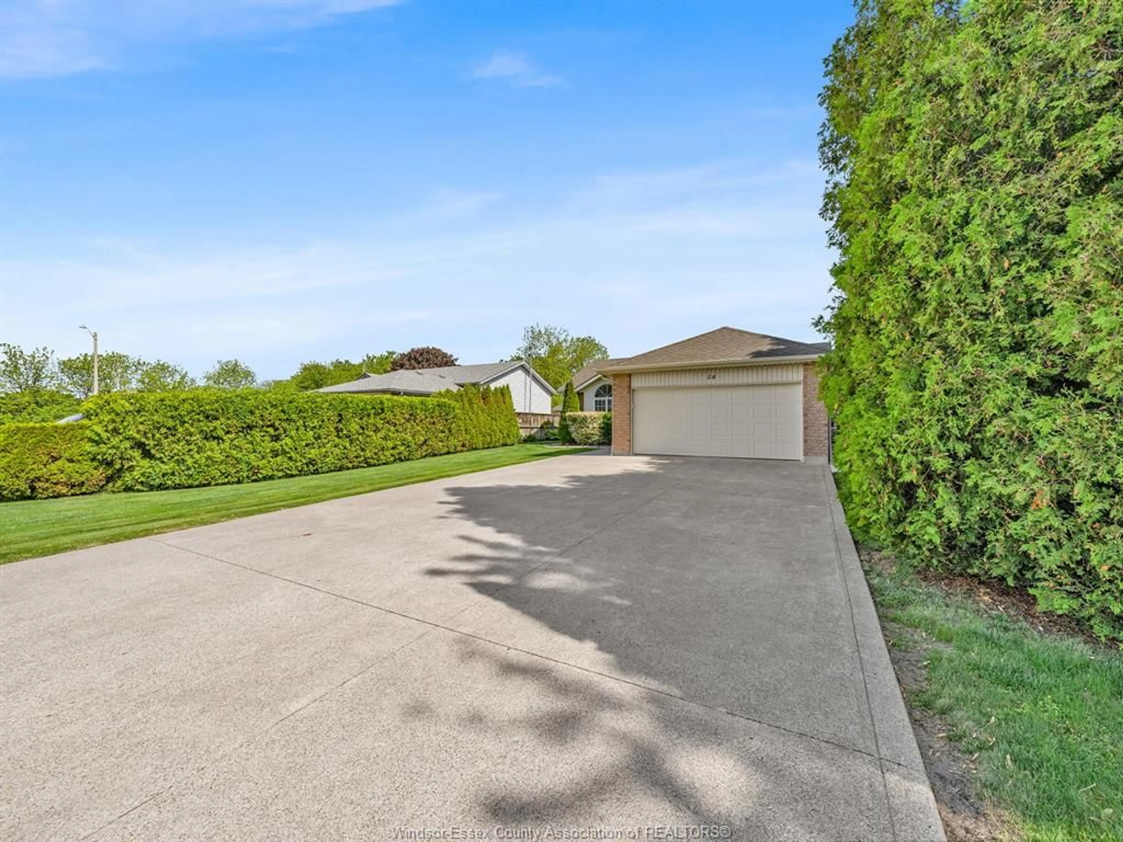A pic from outside/outdoor area/front of a property/back of a property/a pic from drone, street for 54 HOPE Cres, Colchester Ontario N0R 1G0