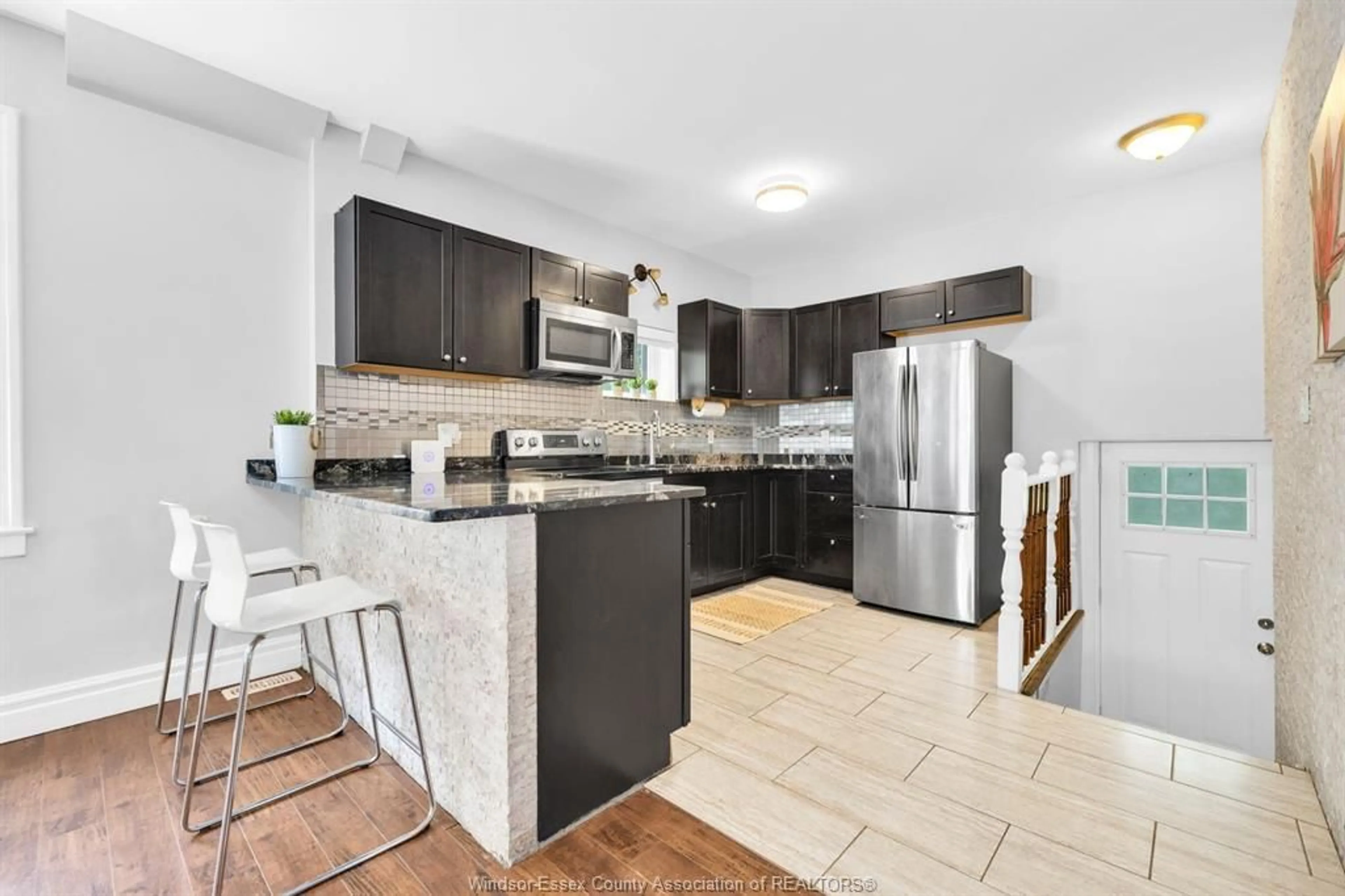 Open concept kitchen, ceramic/tile floor for 1341 McKay, Windsor Ontario N9B 2B1