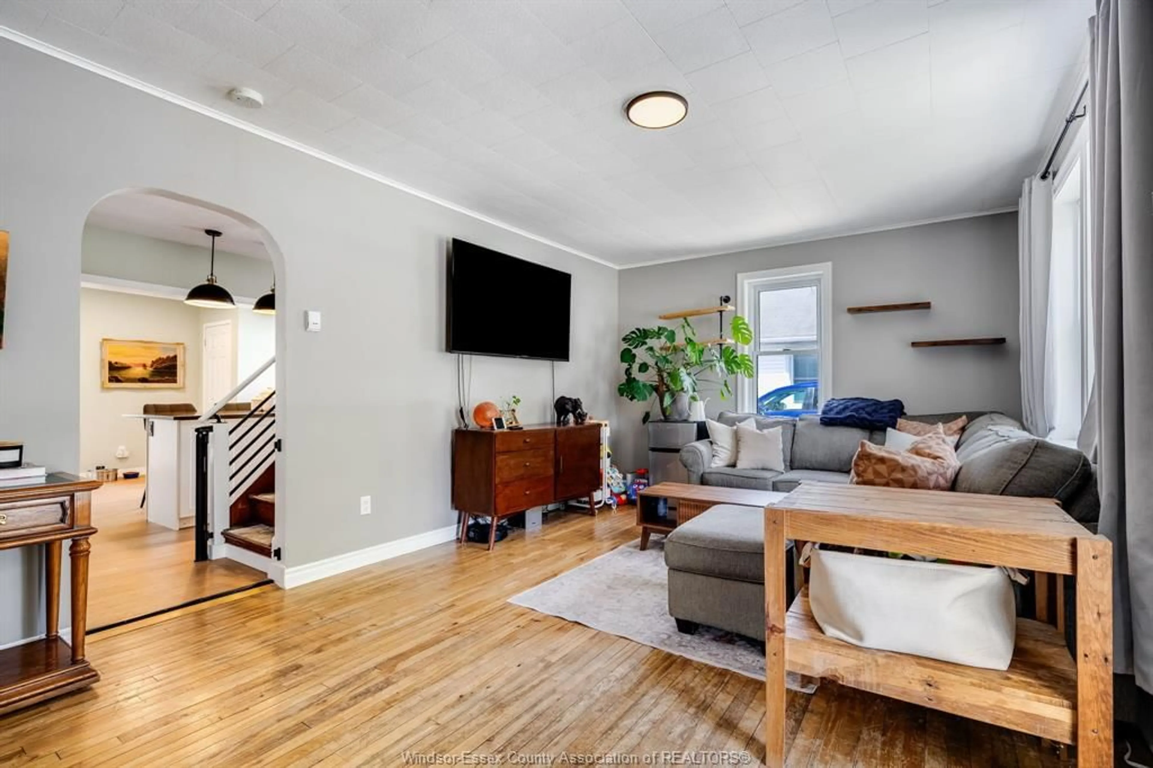 Living room with furniture, wood/laminate floor for 44 MCLEAN, Kingsville Ontario N8Y 1X8