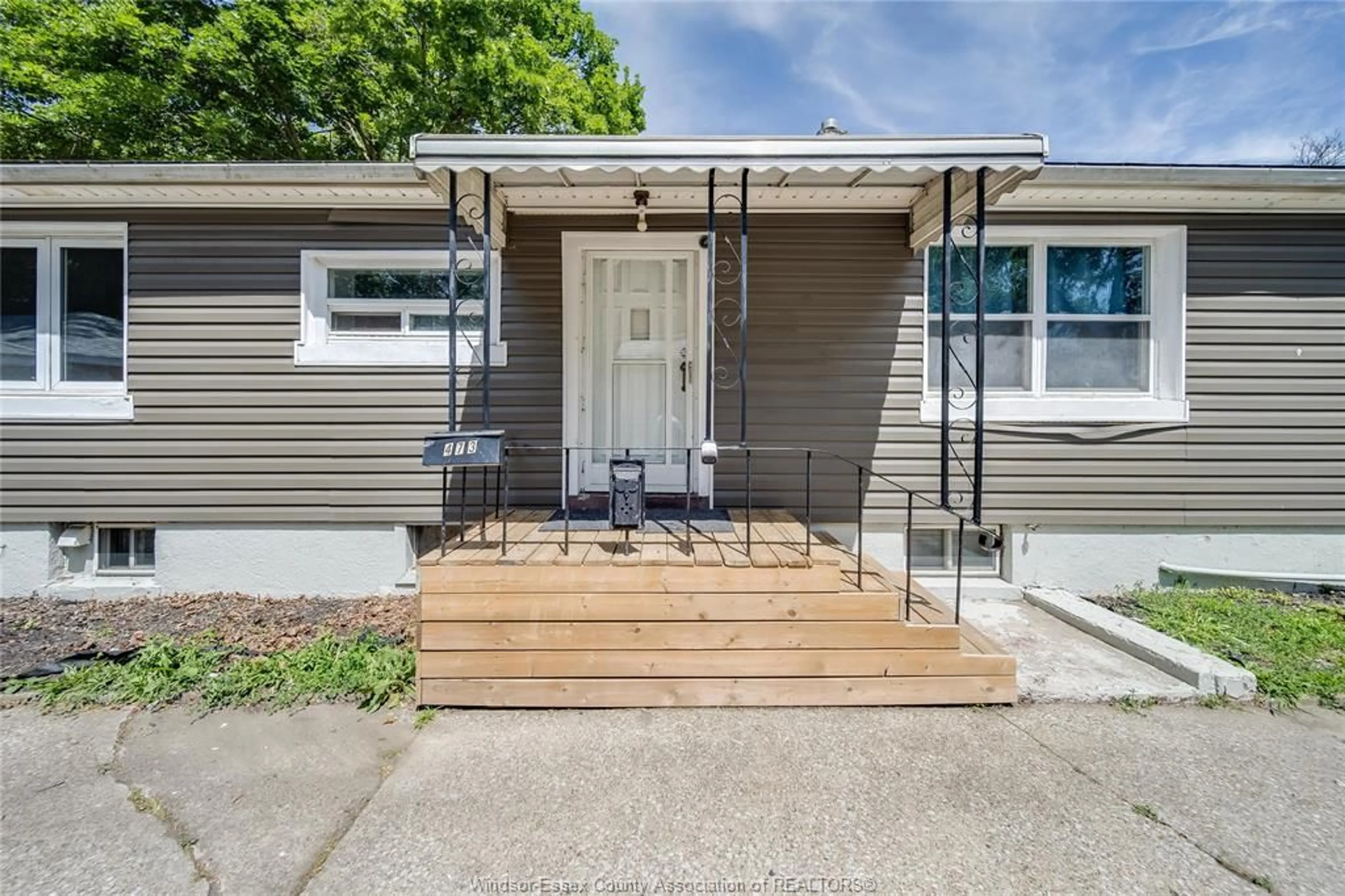 Home with vinyl exterior material, street for 473 INDIAN Rd, Windsor Ontario N9C 2M3