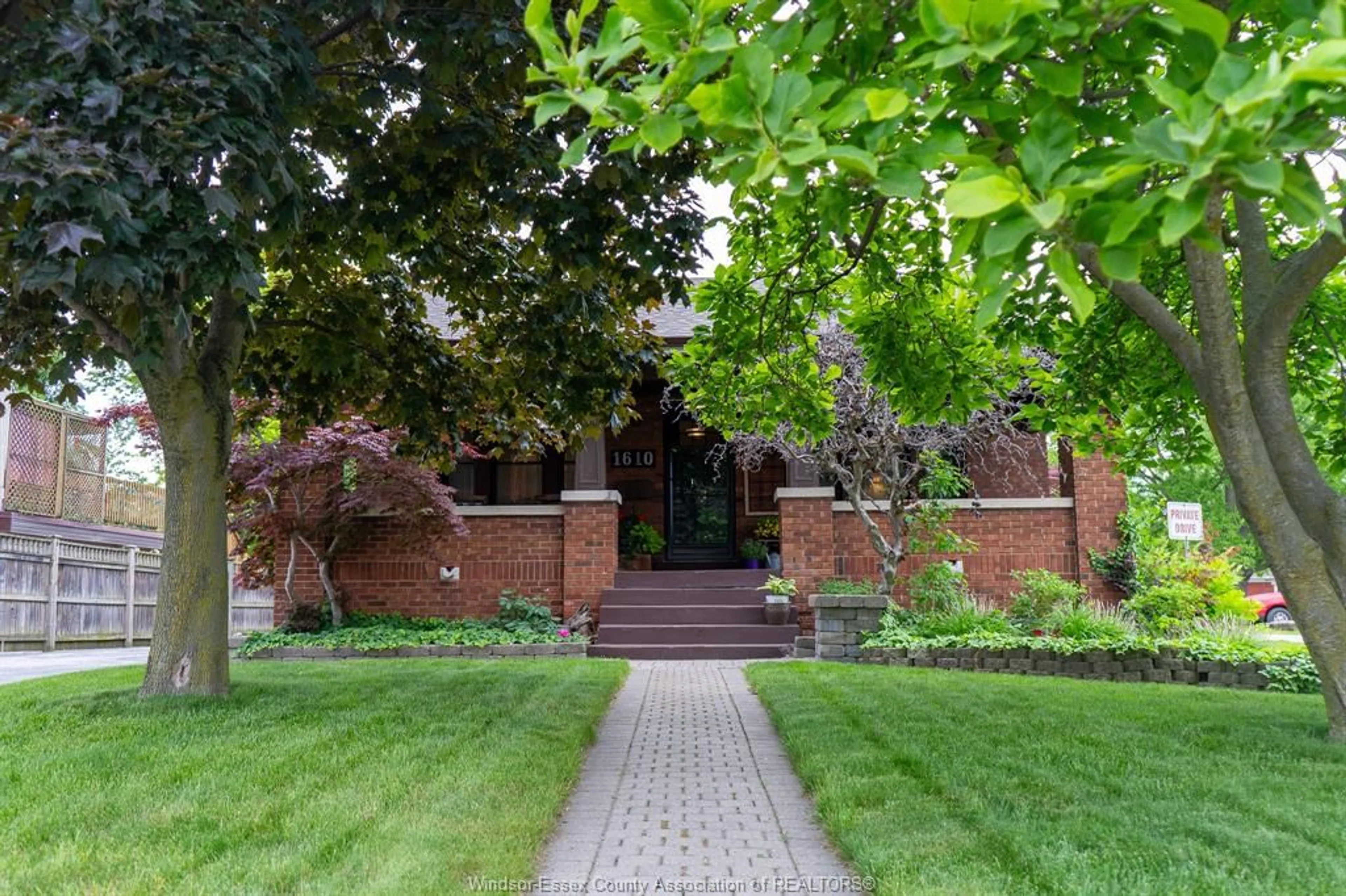 Home with brick exterior material, street for 1610 Front Rd, LaSalle Ontario N9J 2B6