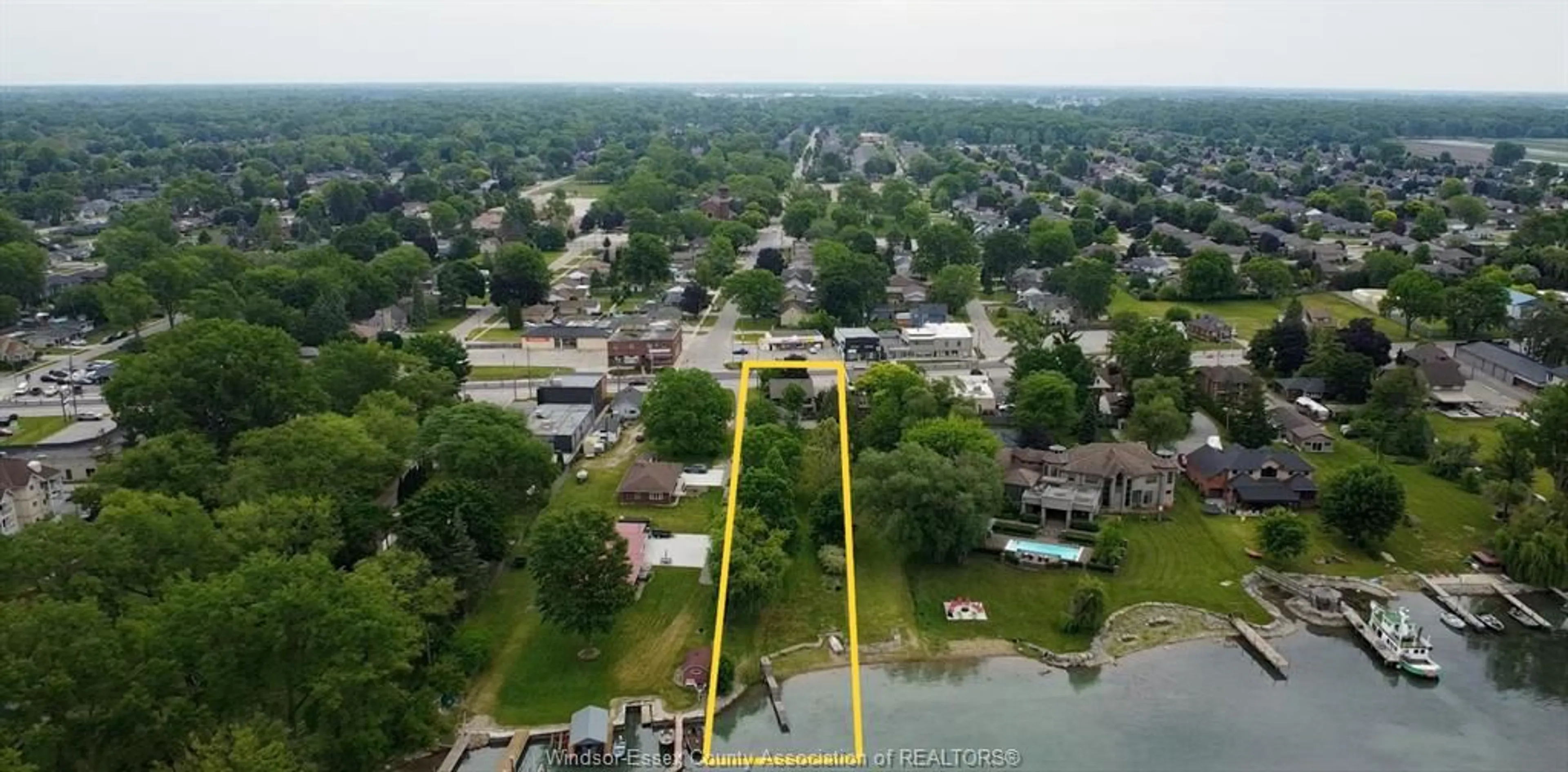 A pic from outside/outdoor area/front of a property/back of a property/a pic from drone, water/lake/river/ocean view for 1610 Front Rd, LaSalle Ontario N9J 2B6