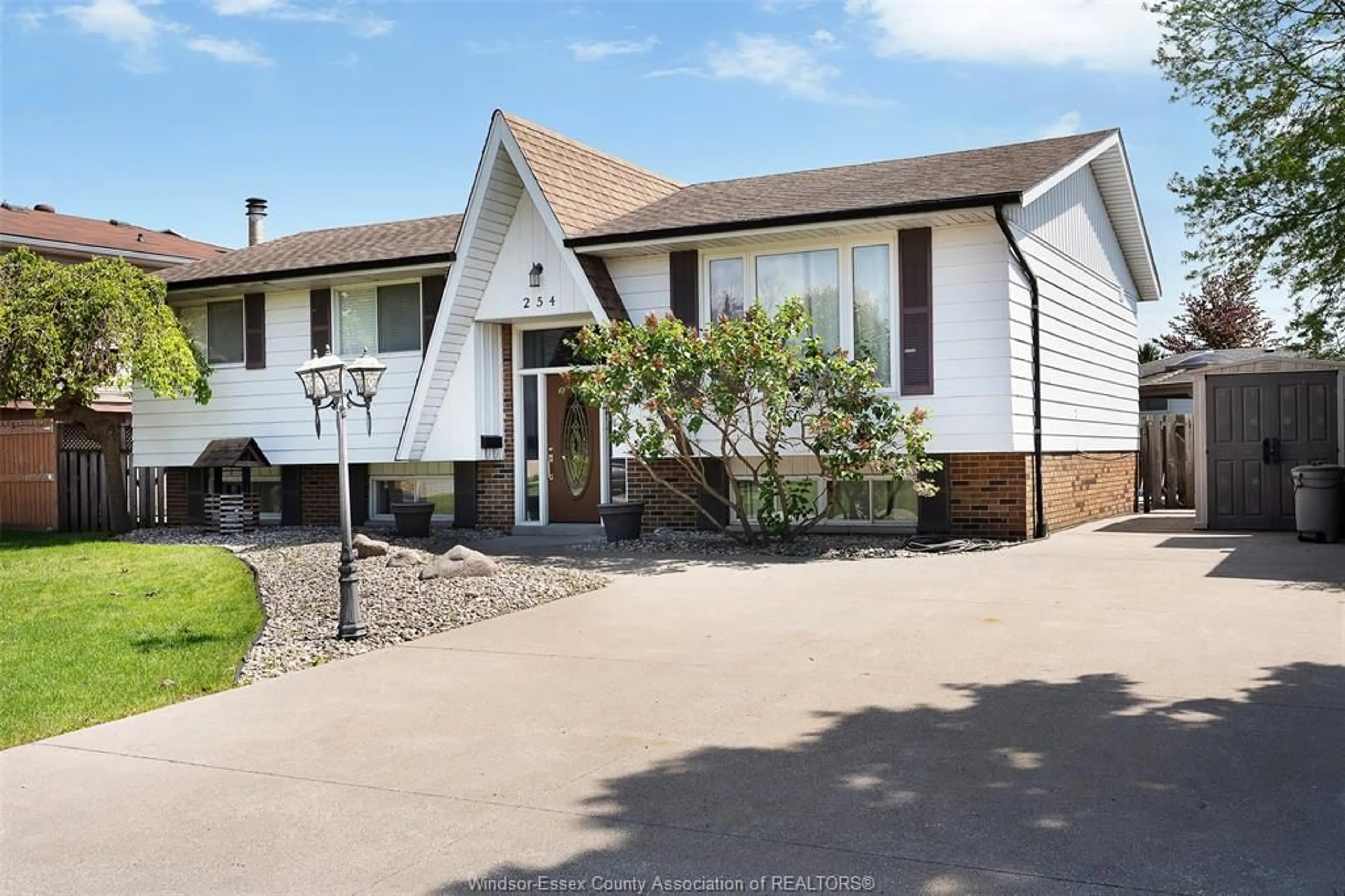 A pic from outside/outdoor area/front of a property/back of a property/a pic from drone, street for 254 TERRA LOU Dr, Belle River Ontario N8L 0L7