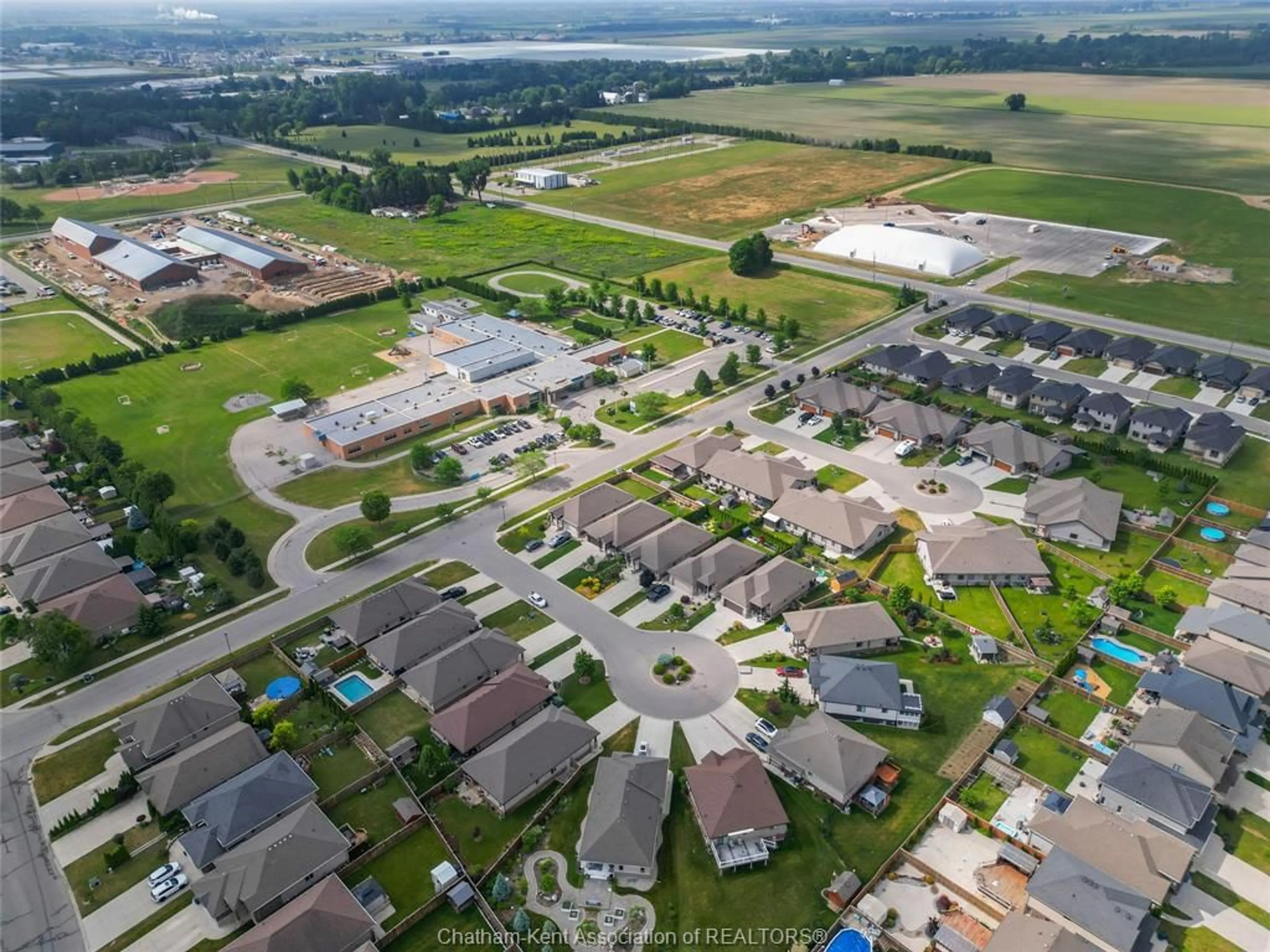 A pic from outside/outdoor area/front of a property/back of a property/a pic from drone, street for 513 Eventide Pl, Chatham Ontario N7L 0G2